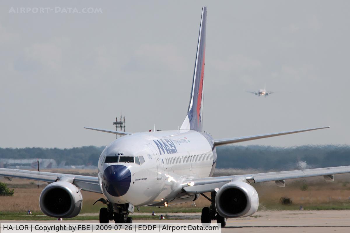HA-LOR, 2004 Boeing 737-7Q8 C/N 29355, holding point RW18W