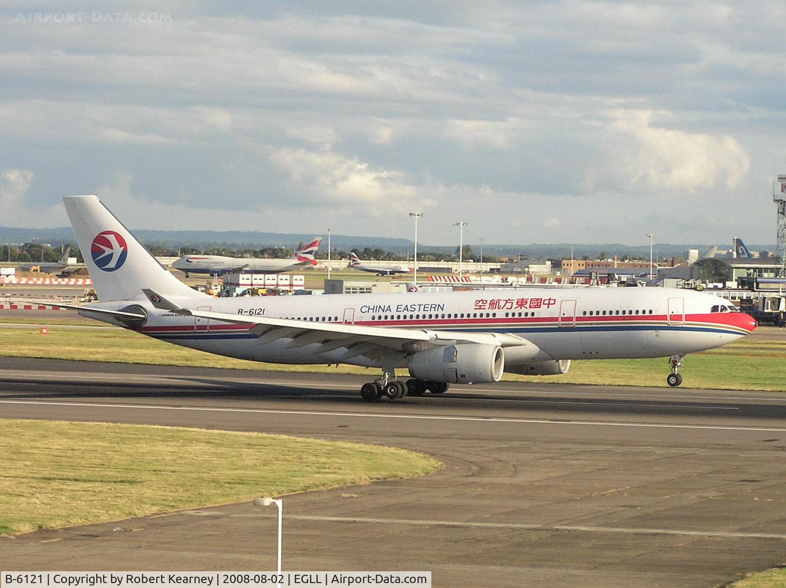 B-6121, 2006 Airbus A330-243 C/N 728, China Eastern just touching down