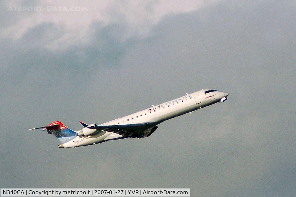 N340CA, 2002 Bombardier CRJ-701ER (CL-600-2C10) Regional Jet C/N 10062, takeoff