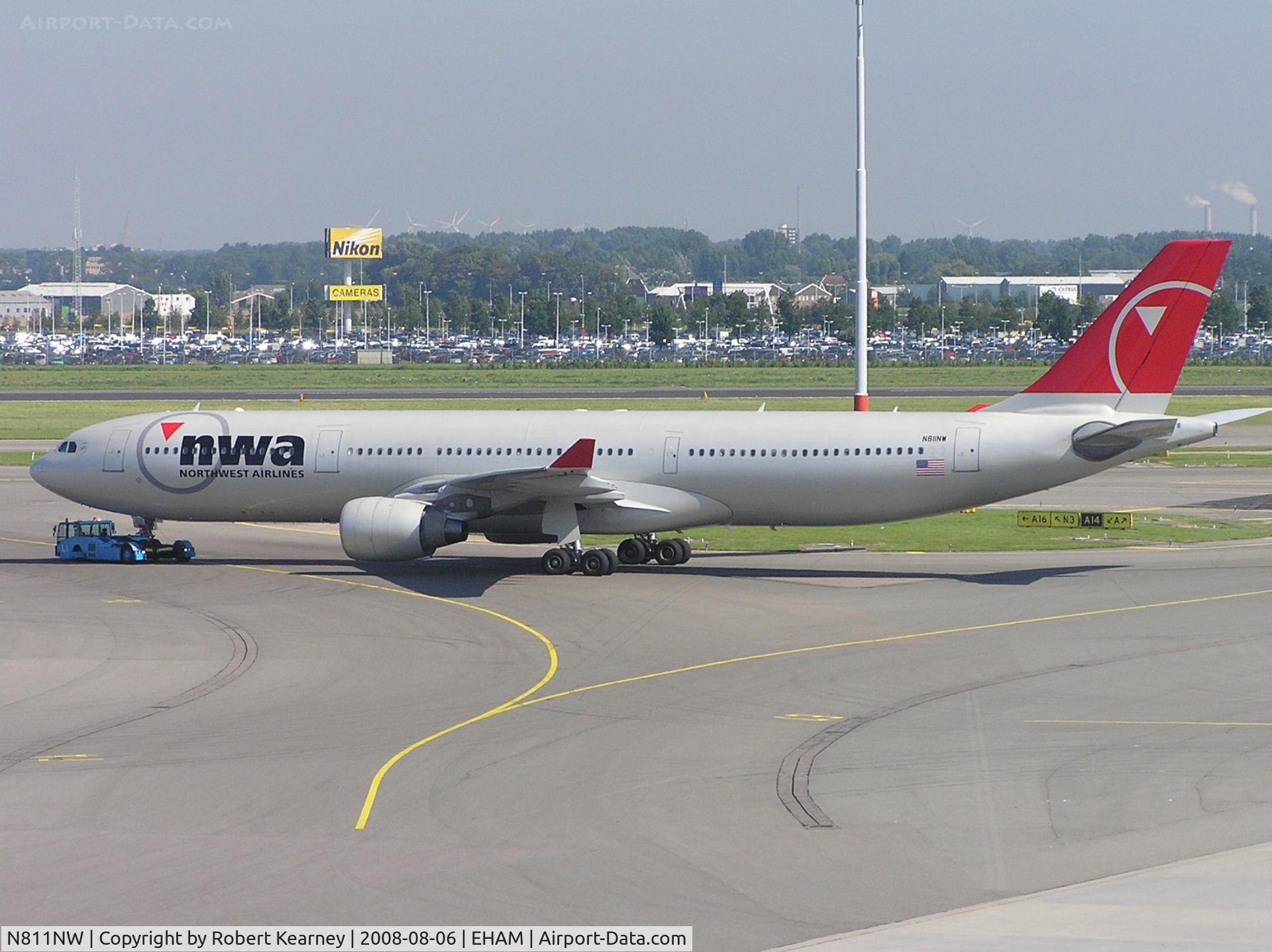 N811NW, 2005 Airbus A330-323 C/N 0690, NWA on tow