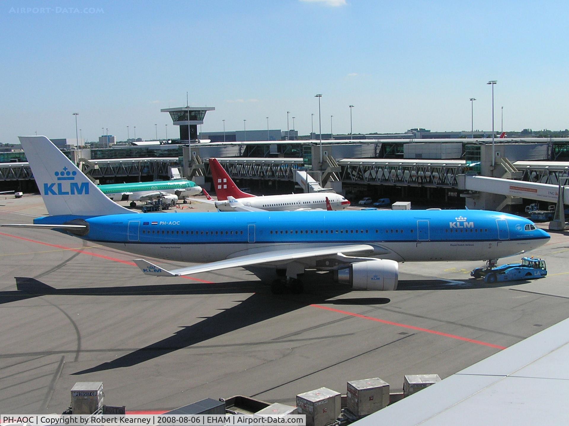 PH-AOC, 2005 Airbus A330-203 C/N 703, KLM being towed onto stand