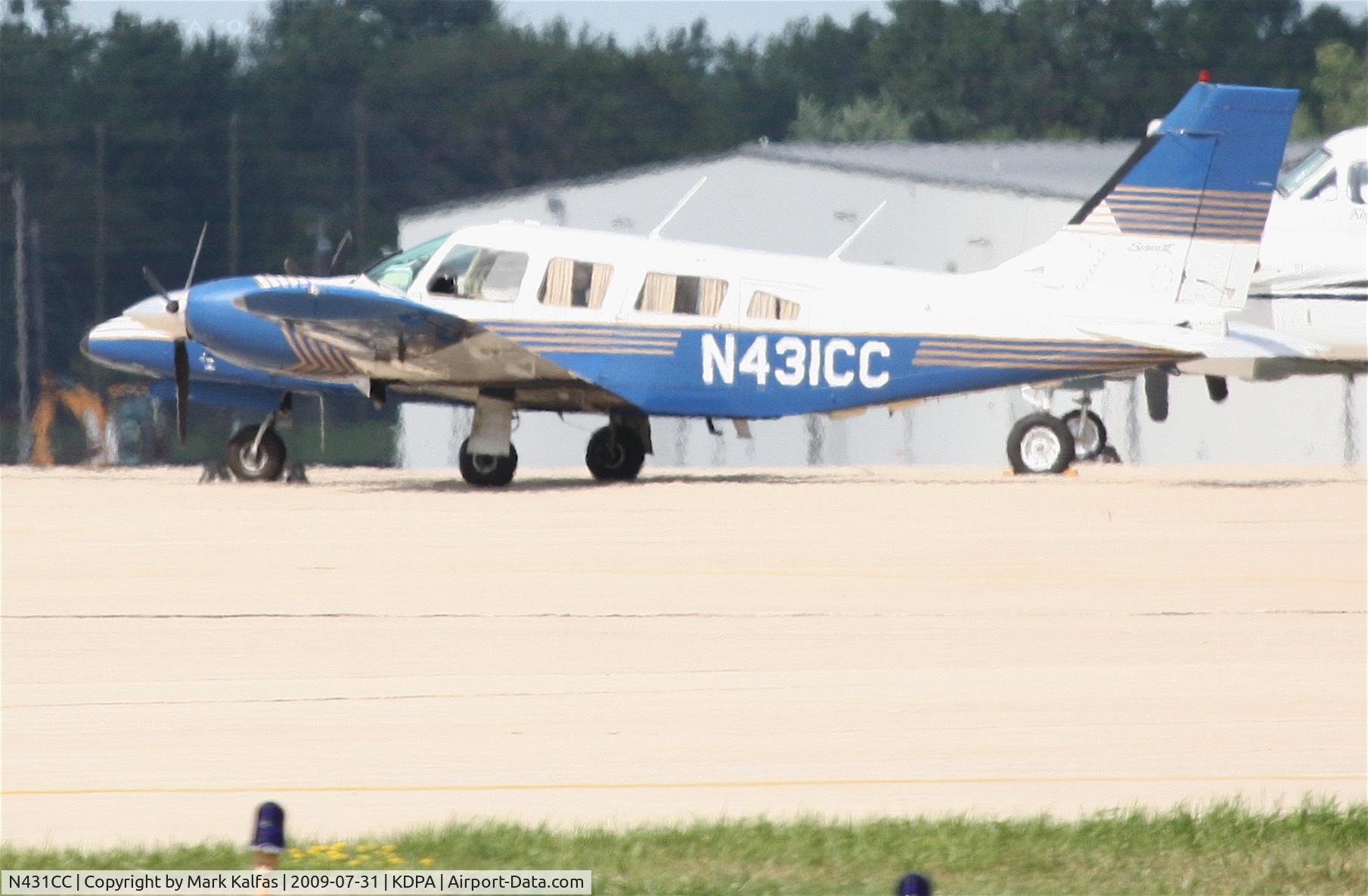 N431CC, 1989 Piper PA-34-220T Seneca III C/N 3433138, KNIGHTON TRANSPORTATION, Piper PA-34-220T Seneca III, N431CC on the ramp KDPA getting ready to go to KMIC.