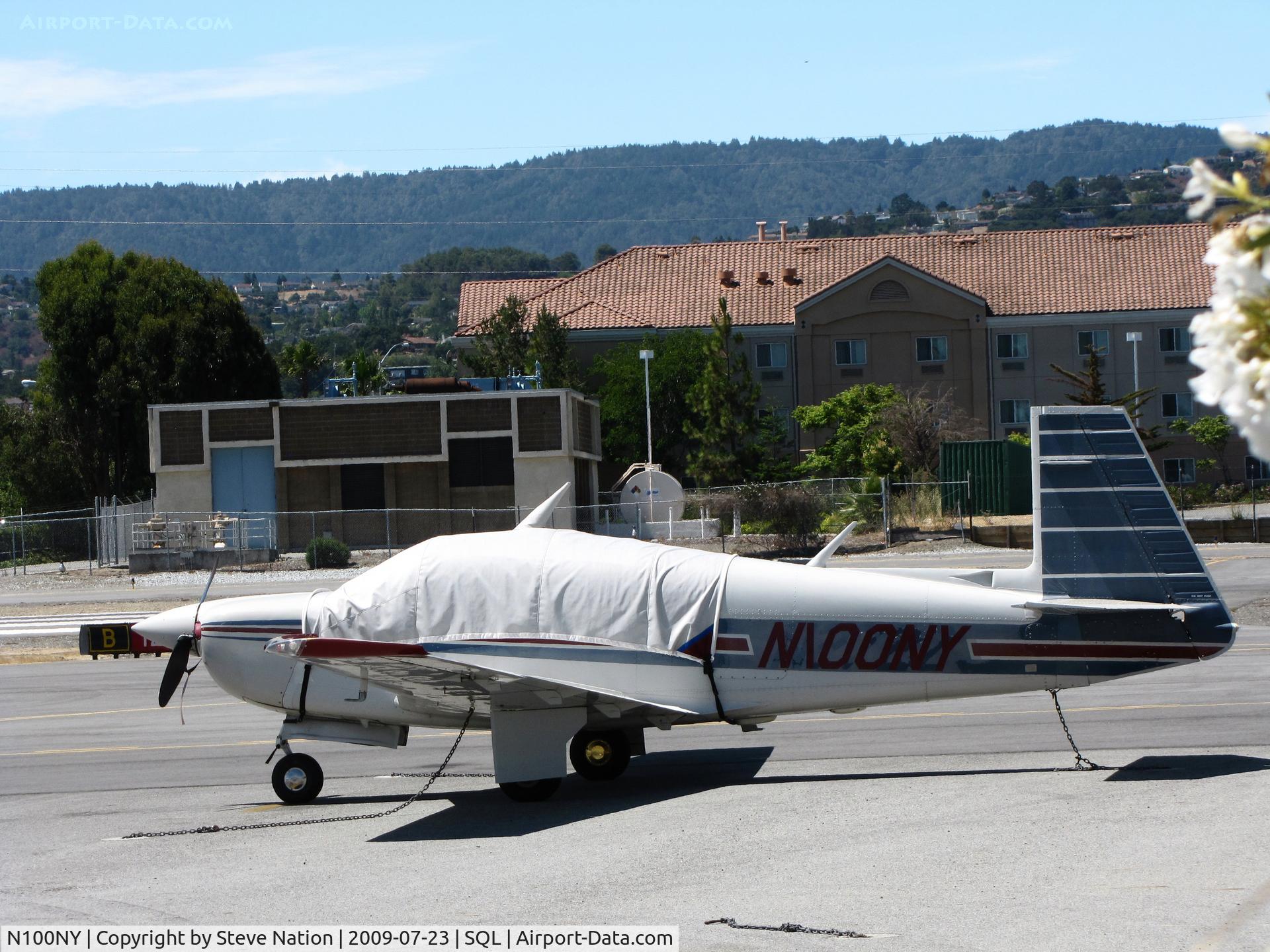 N100NY, 1985 Mooney M20J 201 C/N 24-1526, 1985 Mooney M20J with cover on transient ramp @ San Carlos Muni, CA