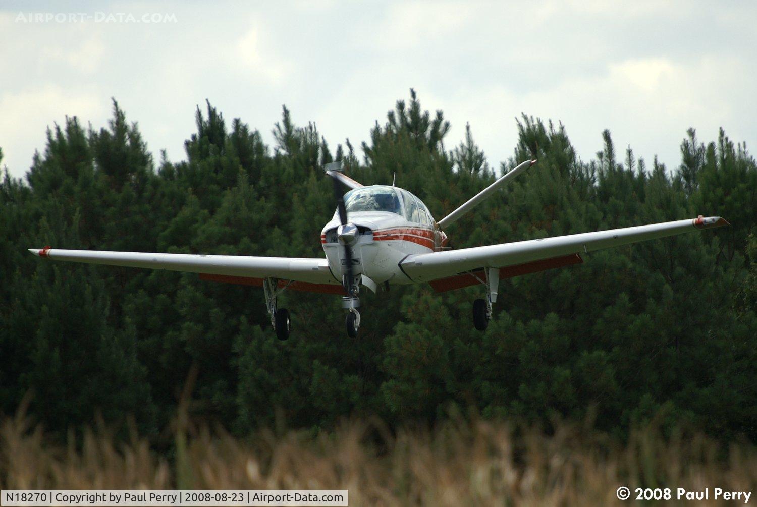 N18270, 1977 Beech V35B Bonanza C/N D-10029, Short final, coming down to the corn