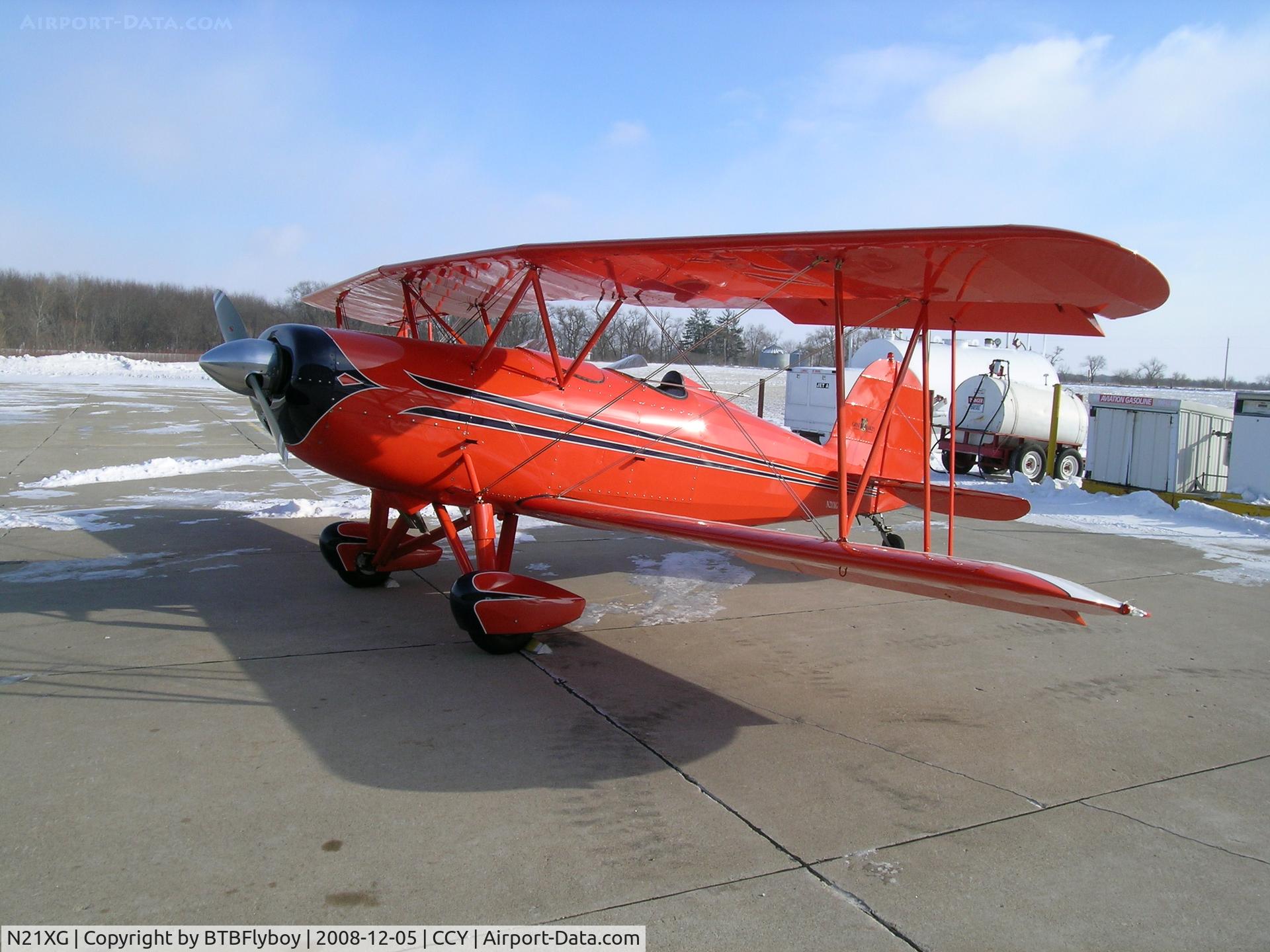 N21XG, 1982 Great Lakes 2T-1A-2 Sport Trainer C/N 1007, on the ramp at Charles City, IA on a very cold and windy day in Dec.