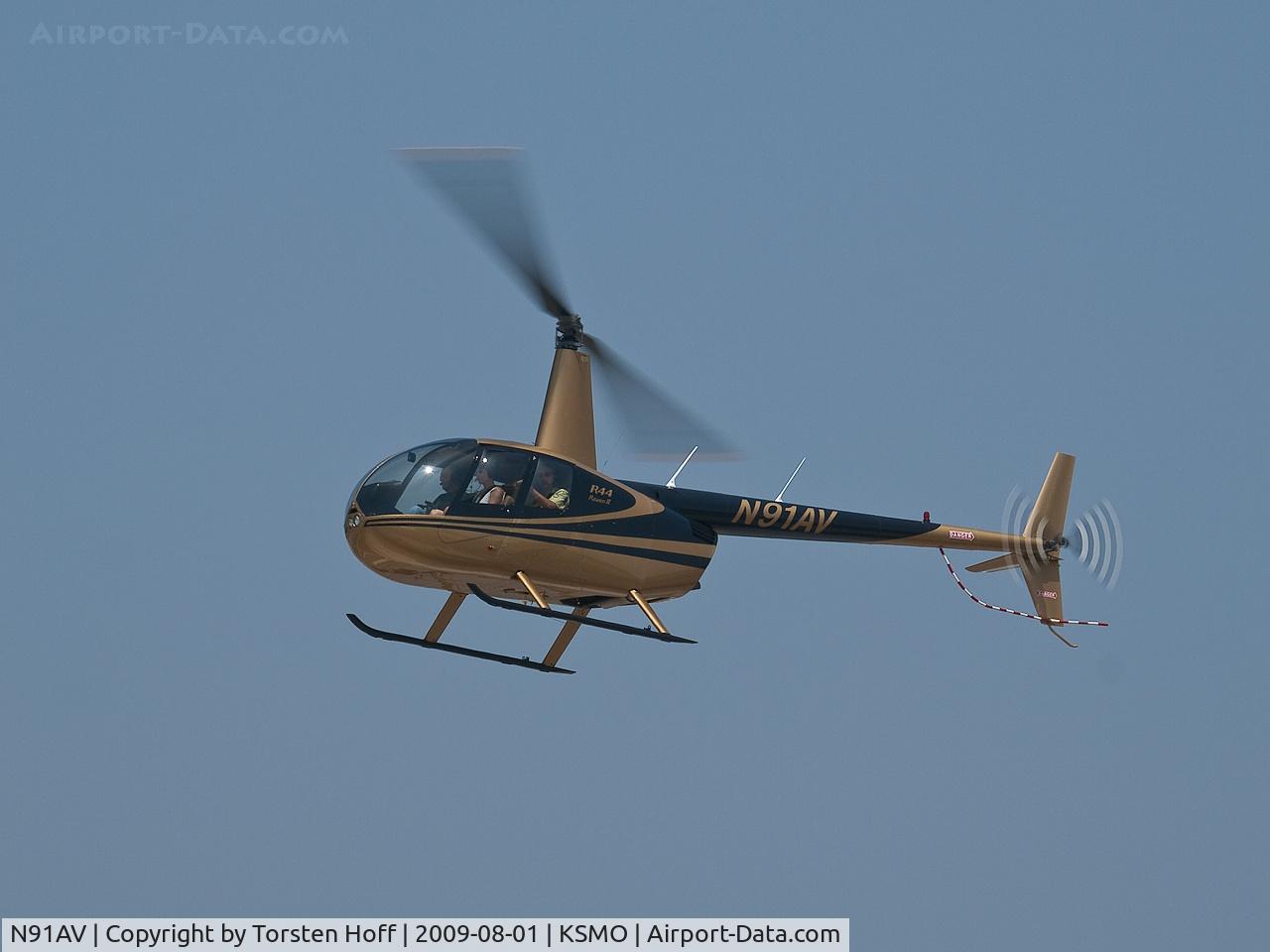 N91AV, 2006 Robinson R44 Raven II C/N 11392, N91AV arriving on RWY 21