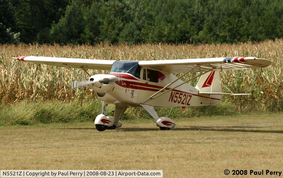 N5521Z, 1962 Piper PA-22-108 Colt C/N 22-9309, Just as she rotates off the turf