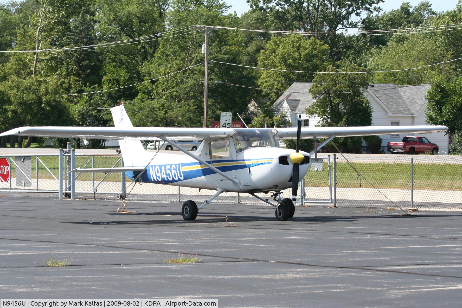 N9456U, 1976 Cessna 150M C/N 15078404, Cessna 150M, N9456U on the north ramp KDPA.
