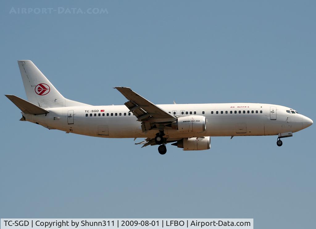 TC-SGD, 1997 Boeing 737-48E C/N 25773, Landing rwy 14R with Air Algerie titles and logos...