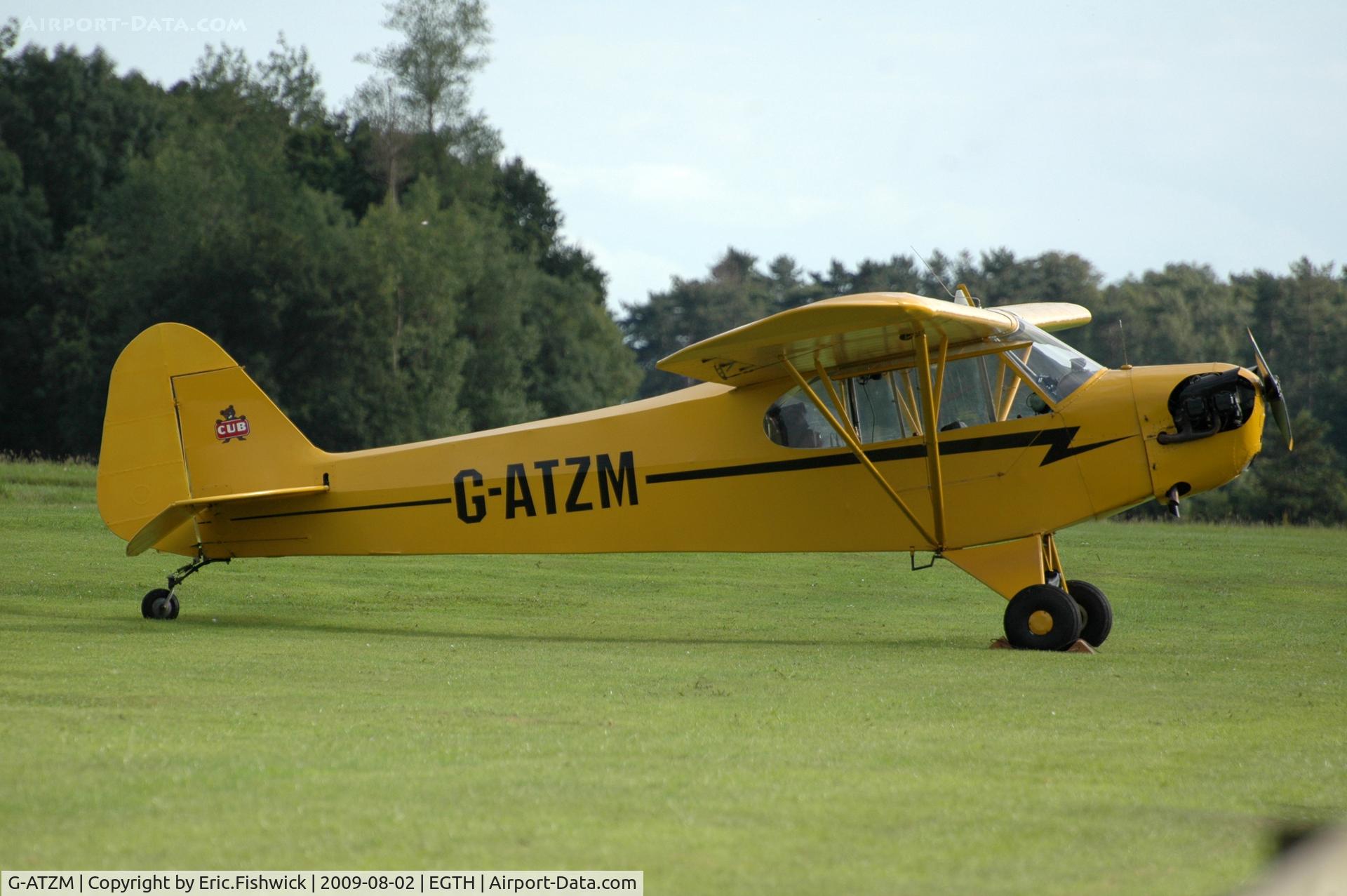 G-ATZM, 1946 Piper J3C (Mod) Cub C/N 20868, G-ATZM departing Shuttleworth Military Pagent Air Display Aug 09