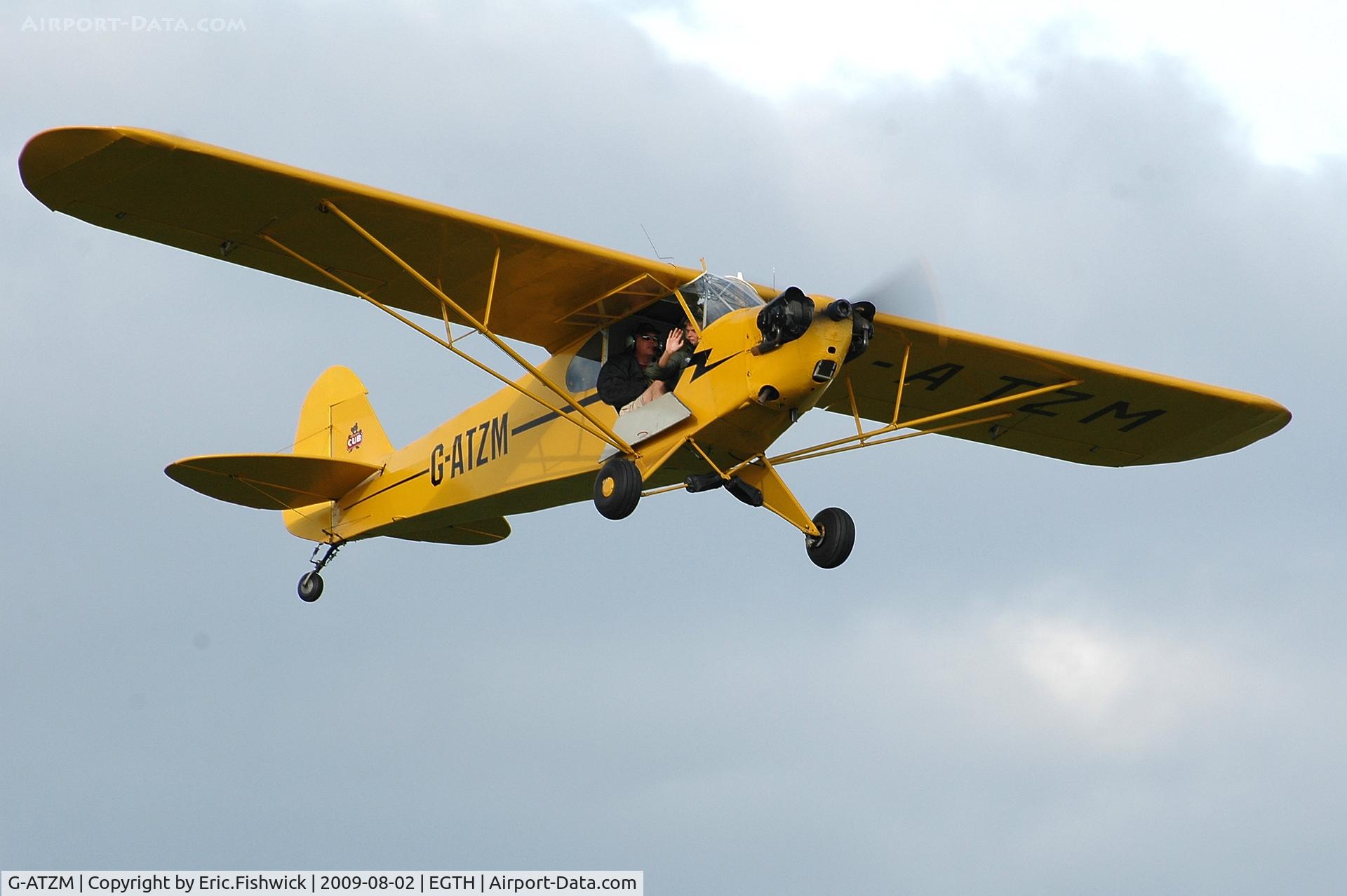G-ATZM, 1946 Piper J3C (Mod) Cub C/N 20868, G-ATZM departing Shuttleworth Military Pagent Air Display Aug 09
