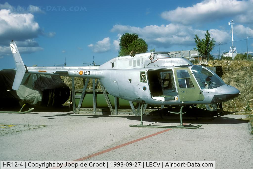 HR12-4, Agusta AB-206A-1 JetRanger C/N 8140, This heli was stipped of all usable parts and parked in a remote corner of the flightline. Now it is part of the Air Force museum collection.