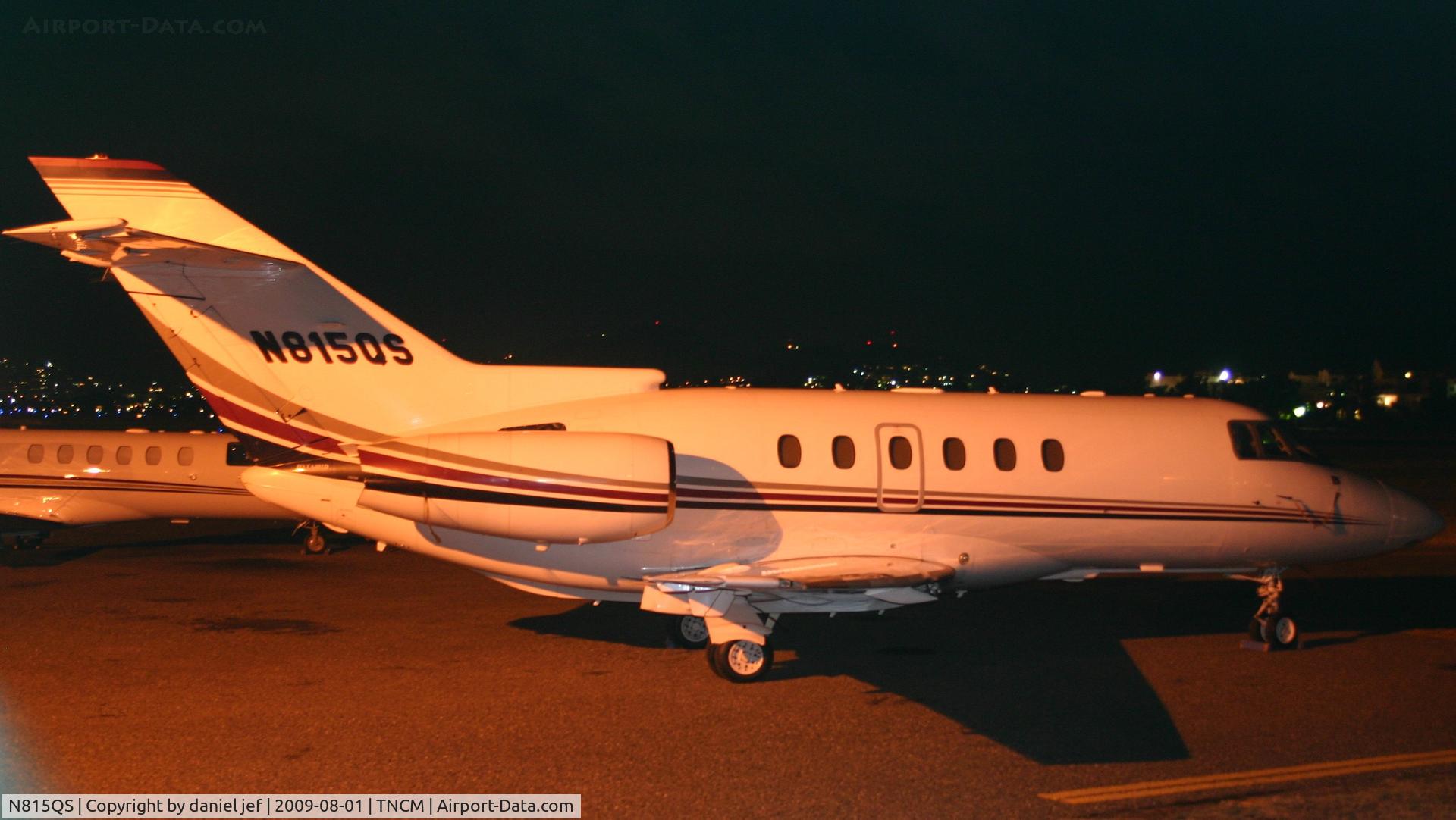 N815QS, 2005 Raytheon Hawker 800XP C/N 258705, park at the cargo ramp under the flood lights