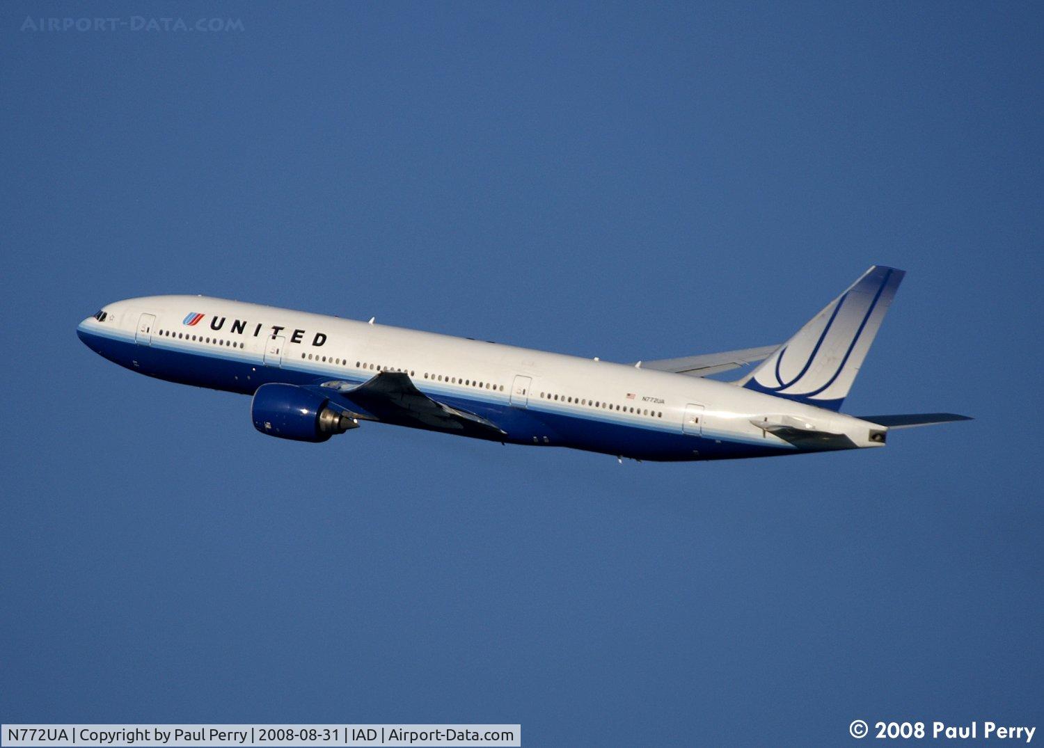 N772UA, 1995 Boeing 777-222 C/N 26930, The white livery picks up the low sun quite brightly