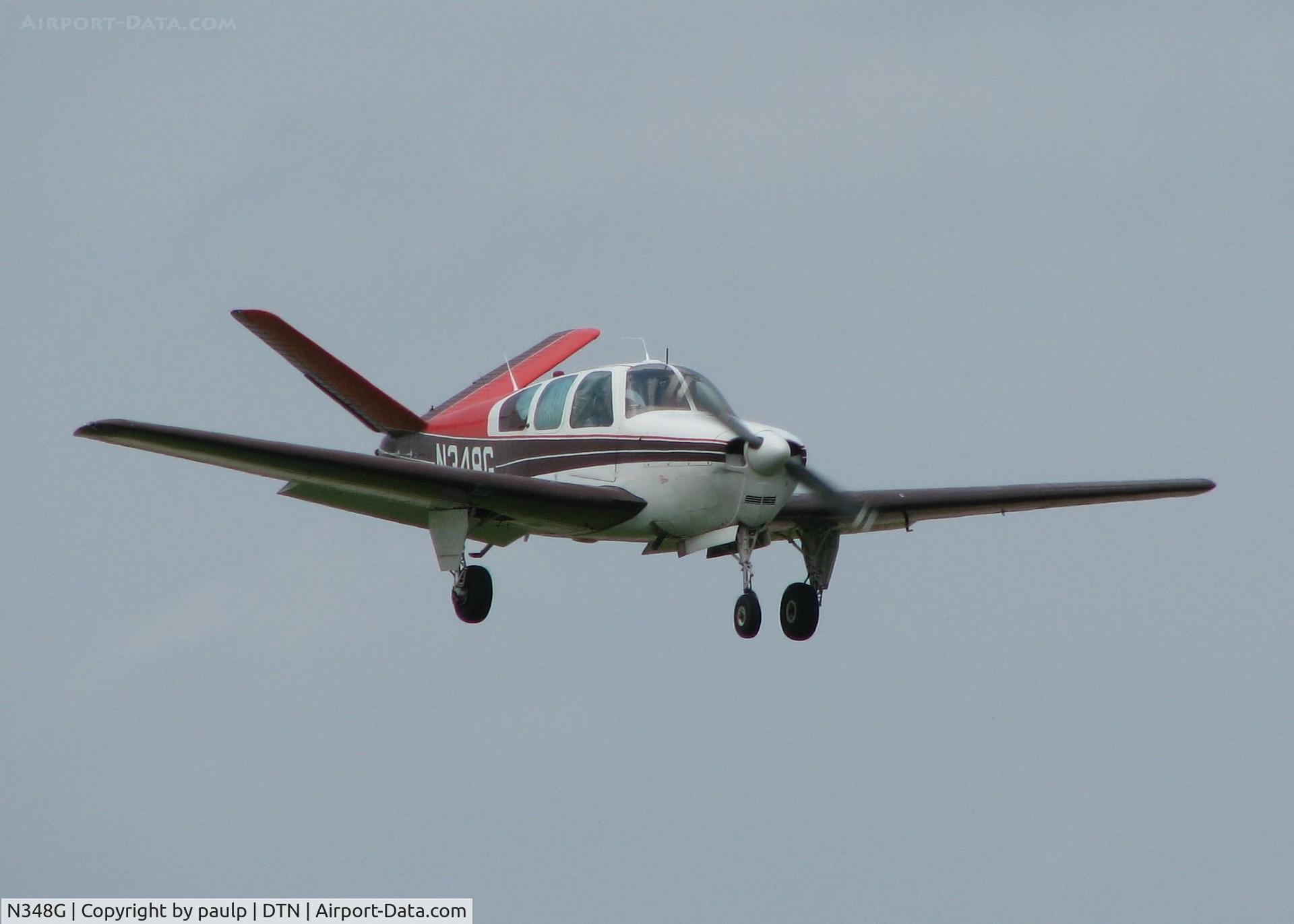 N348G, 1956 Beech G35 Bonanza C/N D-4532, Landing at Downtown Shreveport.