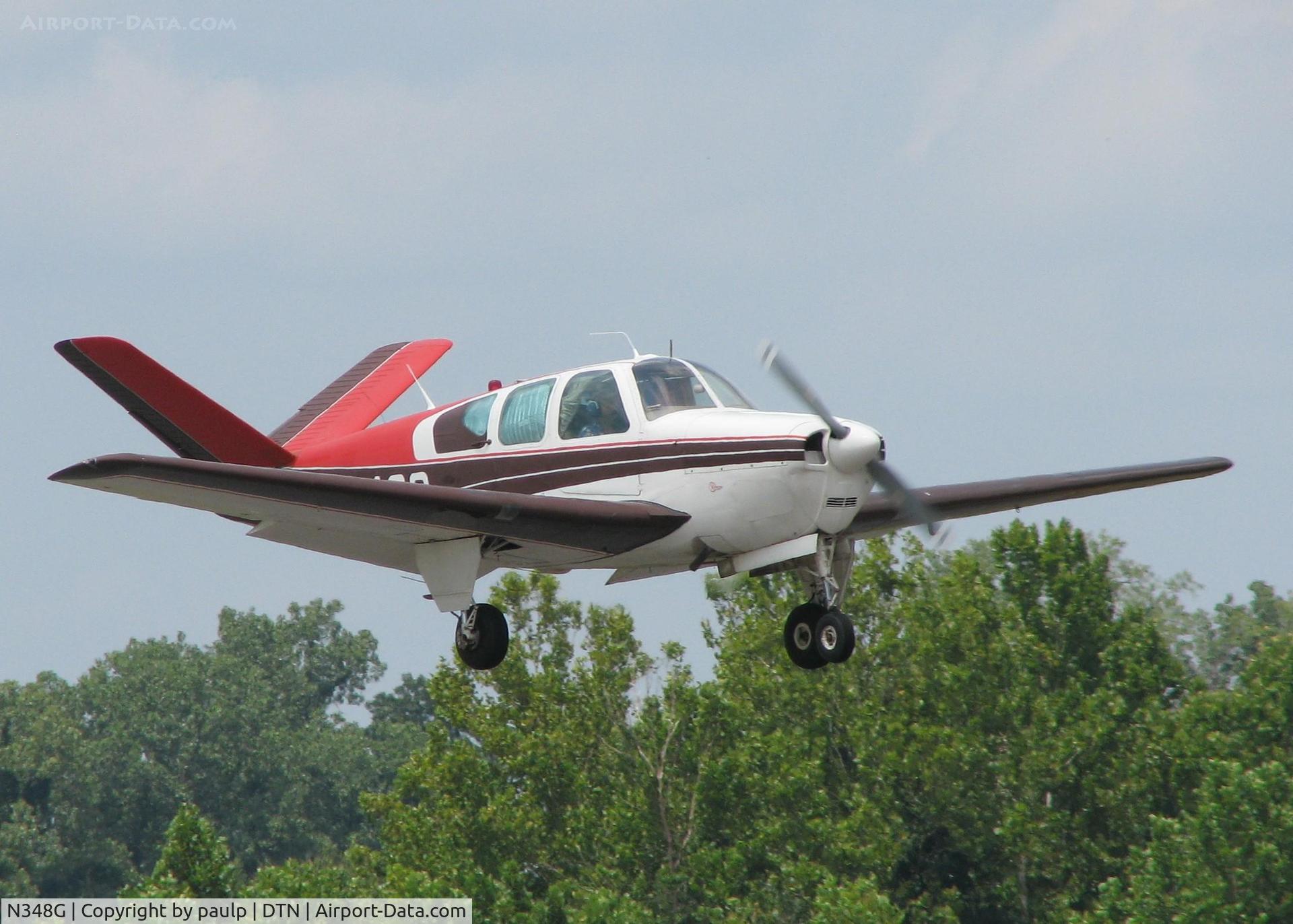 N348G, 1956 Beech G35 Bonanza C/N D-4532, Landing on 14 at Downtown Shreveport.