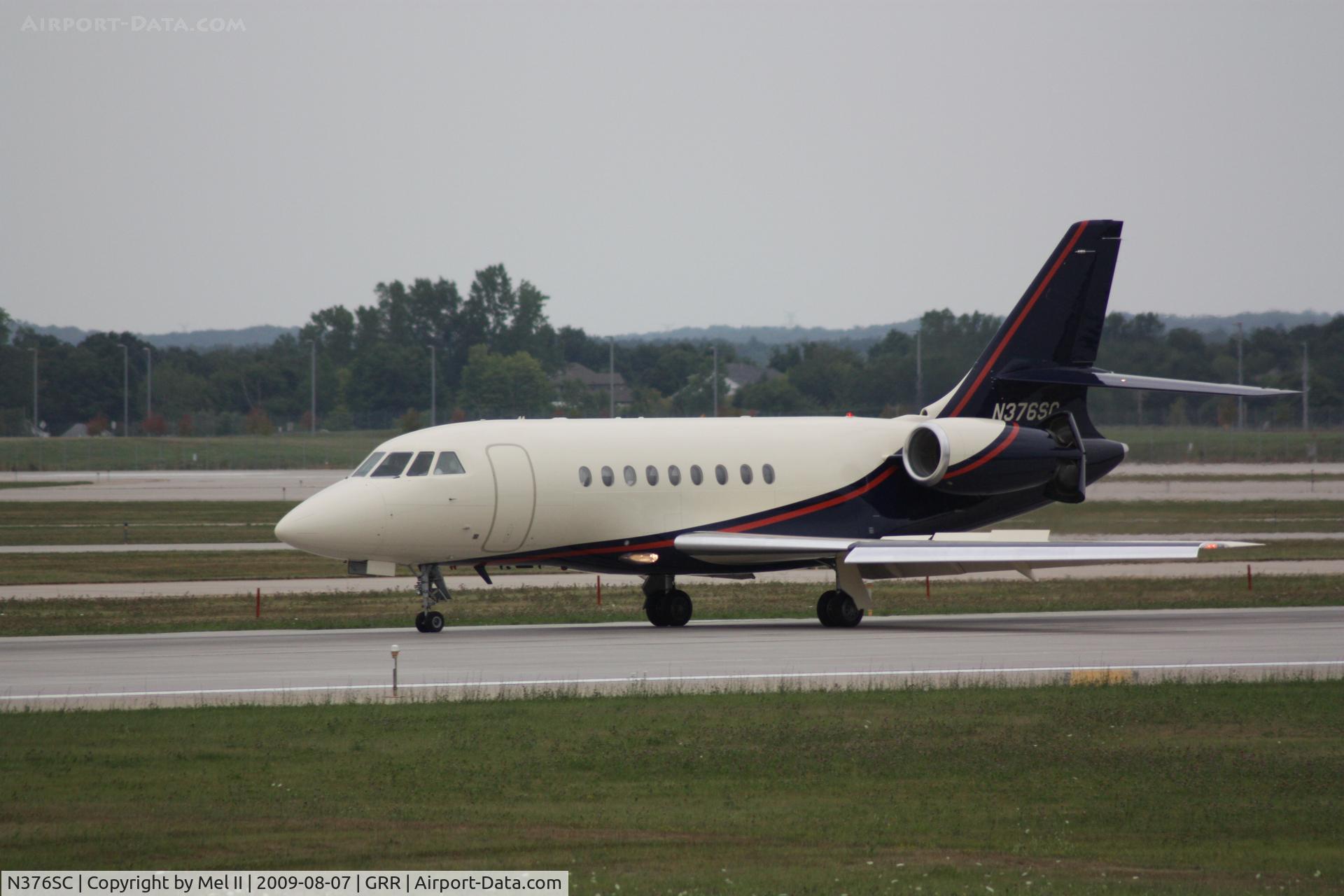 N376SC, 2005 Dassault Falcon 2000EX C/N 57, Landing RWY 26L