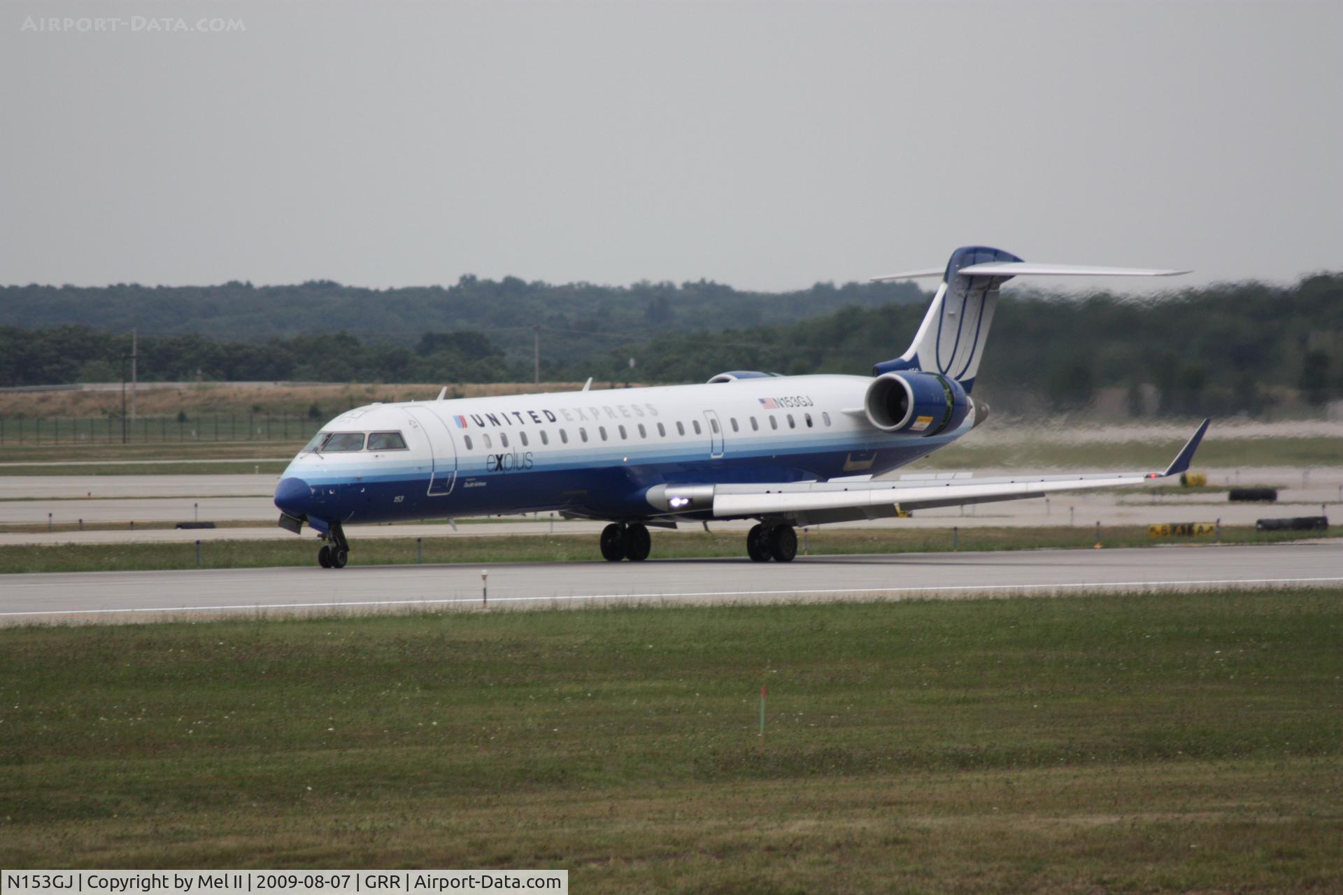N153GJ, 2005 Bombardier CRJ-702 (CL-600-2C10) Regional Jet C/N 10219, GJS7450 - KORD-KGRR - Landing RWY 26L