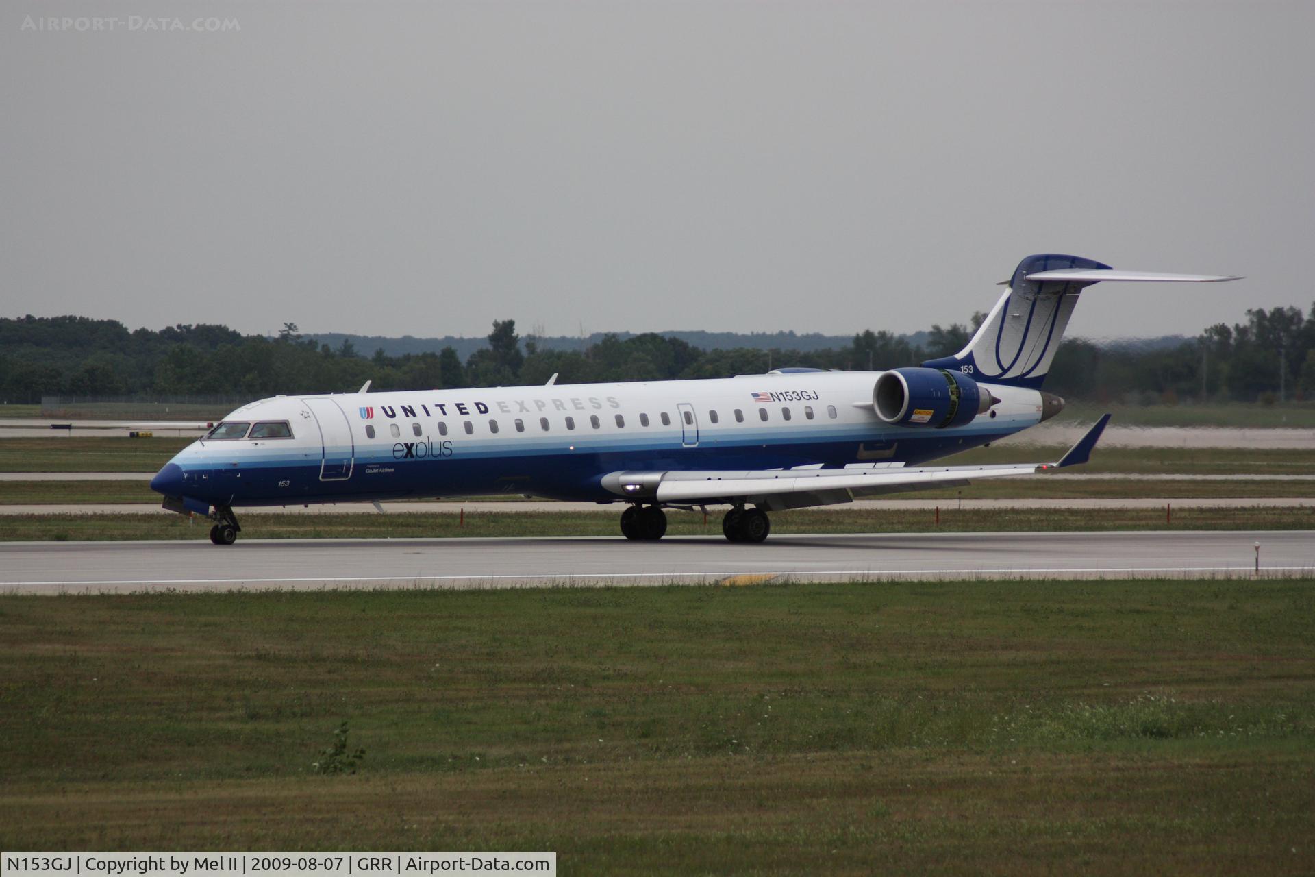 N153GJ, 2005 Bombardier CRJ-702 (CL-600-2C10) Regional Jet C/N 10219, GJS7450 - KORD-KGRR - Landing RWY 26L