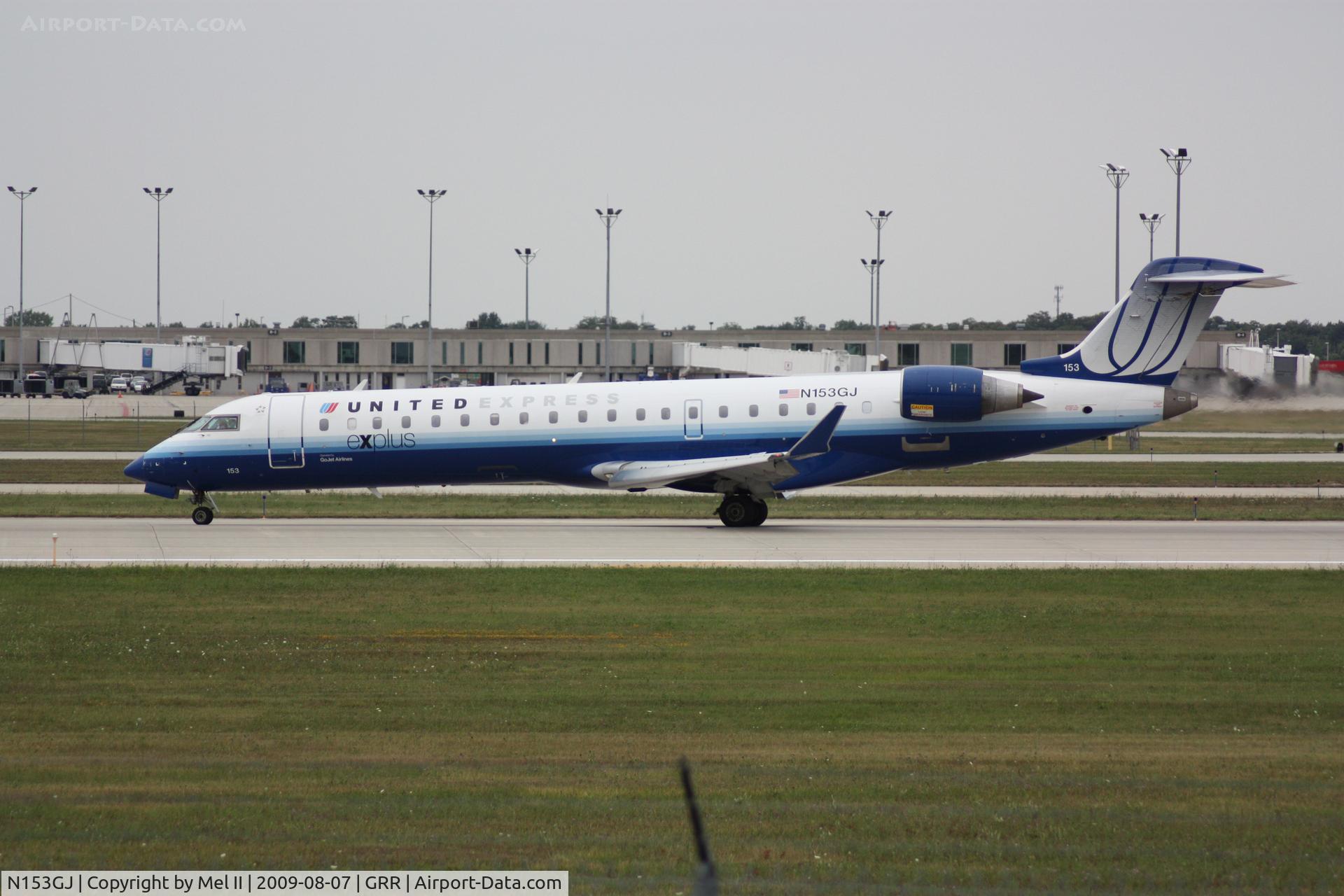 N153GJ, 2005 Bombardier CRJ-702 (CL-600-2C10) Regional Jet C/N 10219, GJS7450 - KORD-KGRR - Landing RWY 26L