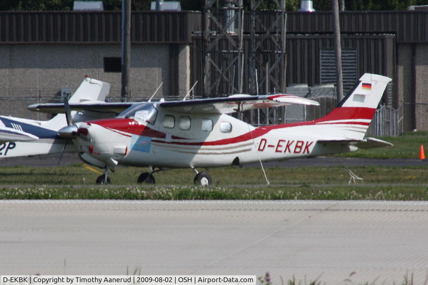 D-EKBK, Cessna P210N Pressurised Centurion C/N P21000661, Cessna P210N, c/n: P21000661, saw this P210 parked across RWY 9-27.  Germany to Oshkosh!