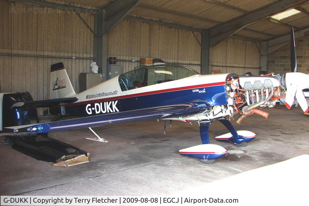 G-DUKK, 2000 Extra EA-300L C/N 125, Extra 300 hangared at Sherburn