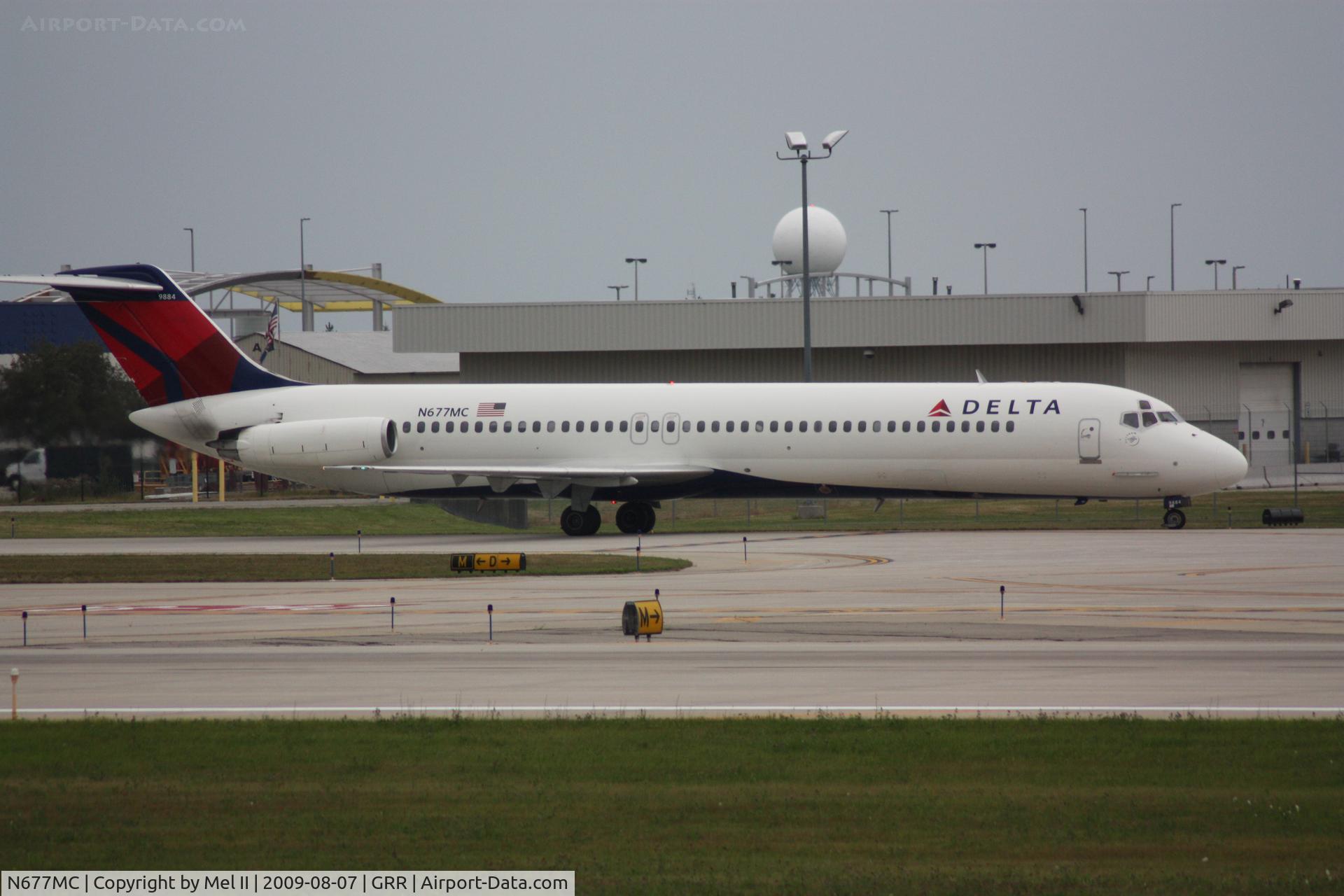 N677MC, 1977 McDonnell Douglas DC-9-51 C/N 47756, NWA1520 - KMSP-KGRR - Taxi From Landing RWY 26L