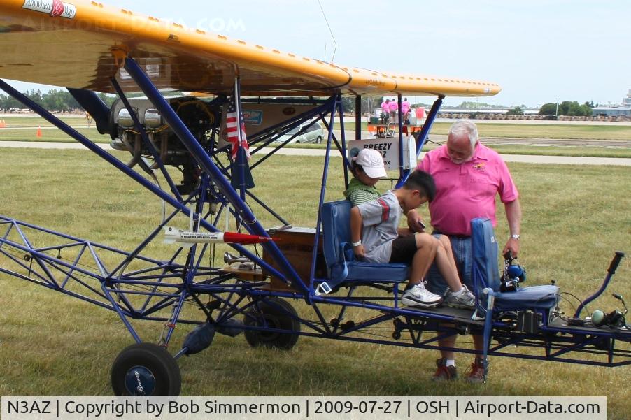 N3AZ, 1998 Breezy RLU-1 C/N JD1, Getting strapped in for a ride at Airventure 2009 - Oshkosh, Wisconsin
