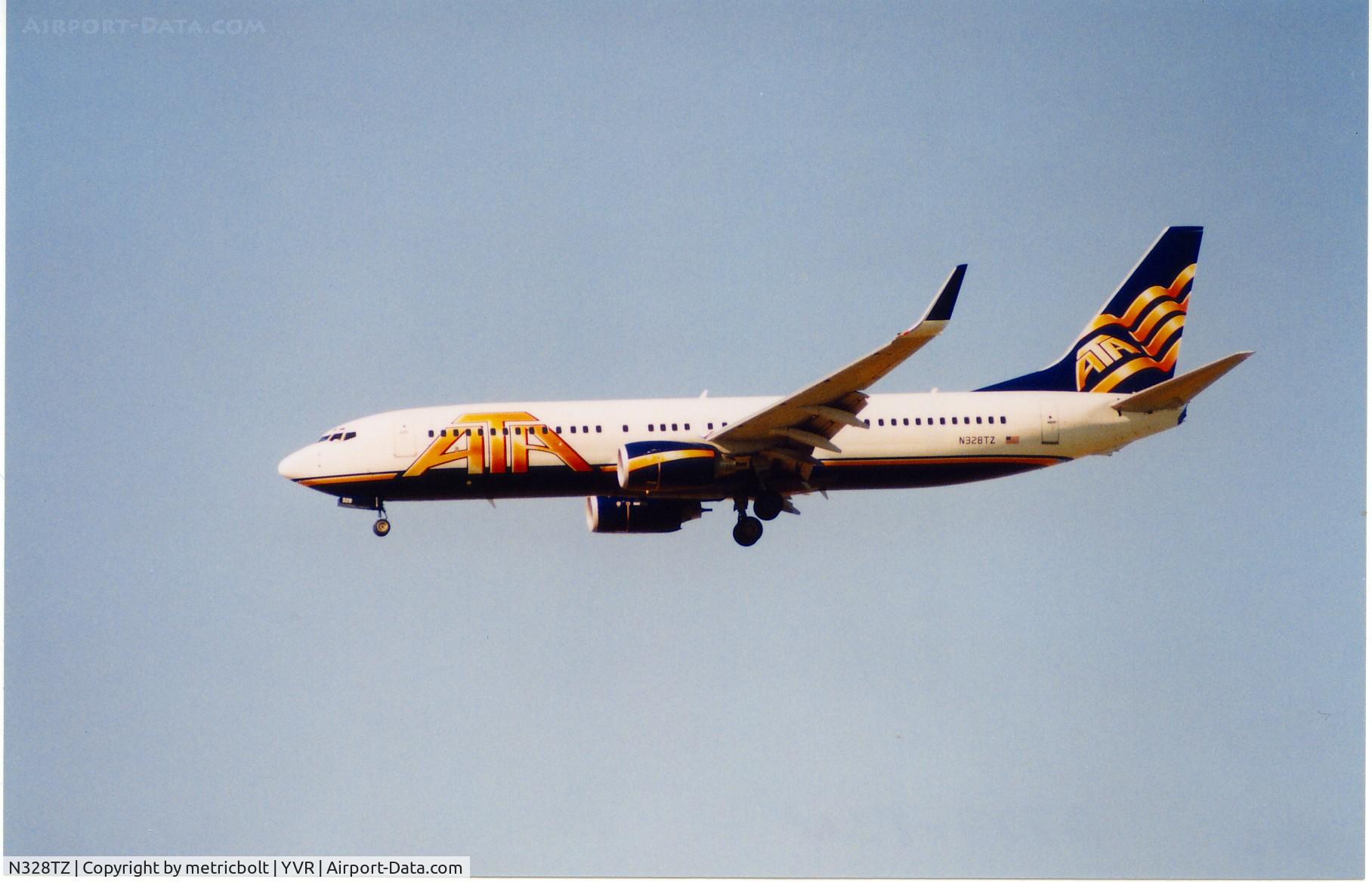 N328TZ, 2002 Boeing 737-83N C/N 32614, Landing at YVR,Aug.2004