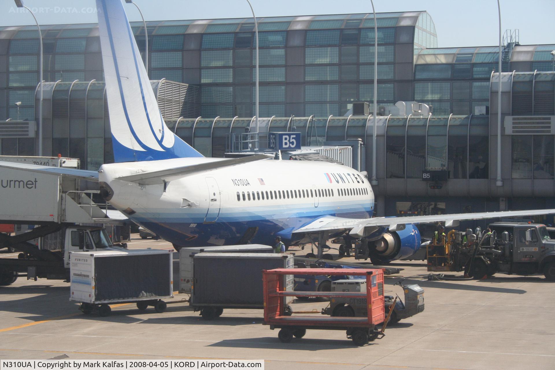N310UA, 1987 Boeing 737-322 C/N 23671, United Airlines Boeing 737-322, N310UA at B5 KORD preparing for a trip over to KLGA.