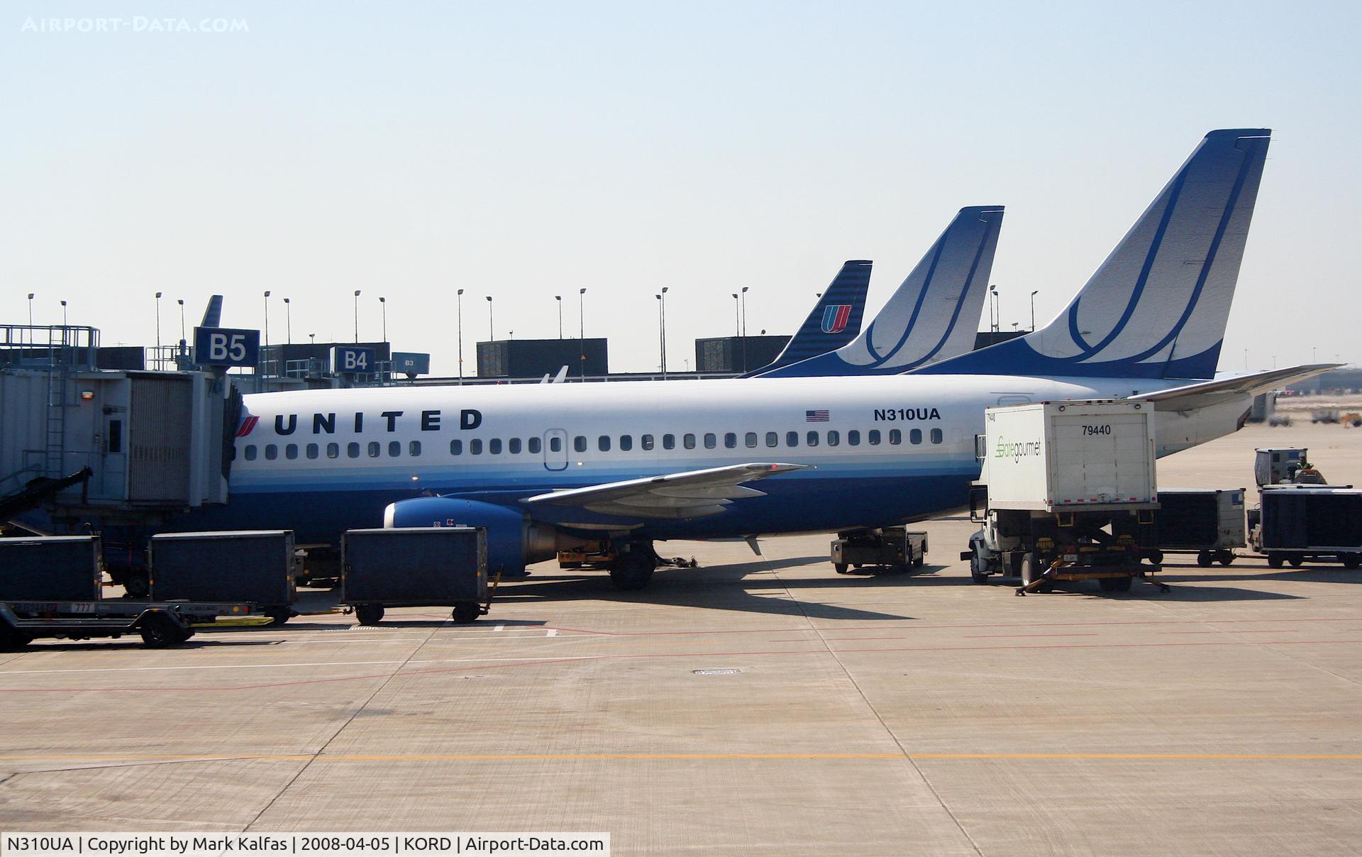 N310UA, 1987 Boeing 737-322 C/N 23671, United Airlines Boeing 737-322, N310UA at B5 KORD preparing for a trip over to KLGA.