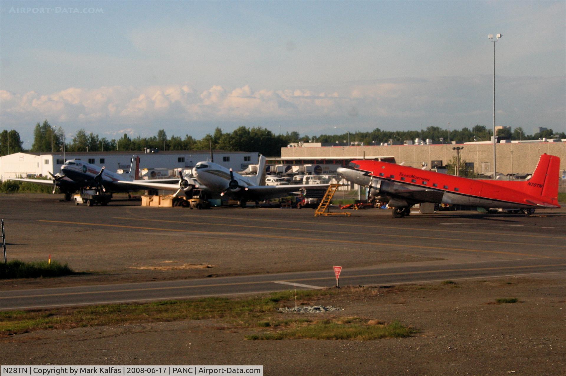 N28TN, 1952 Douglas R4D-8 C/N 43354, TransNorthern Douglas R4D-8, N28TN on the ramp with some sister ships PANC.