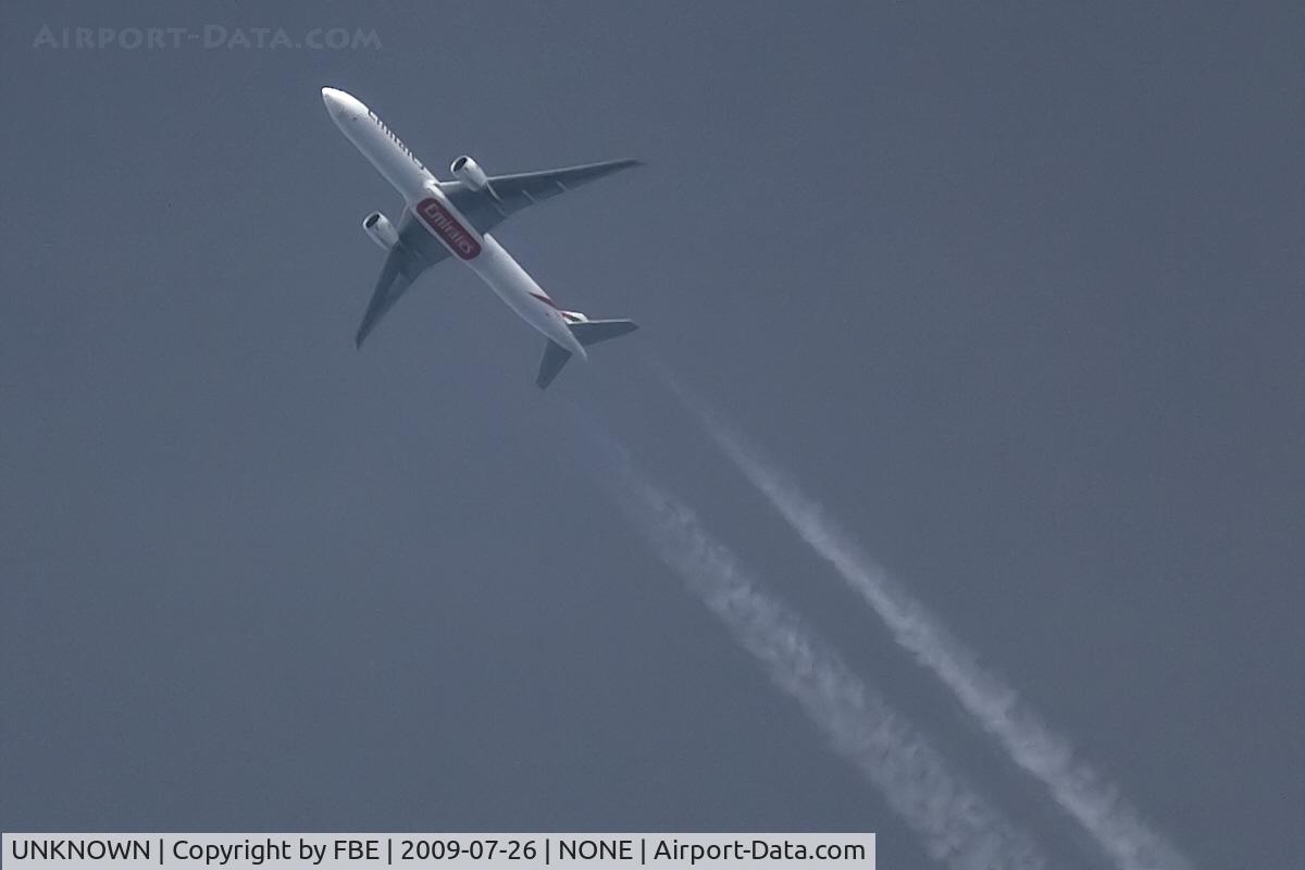 UNKNOWN, Contrails Various C/N Unknown, Emirates Triple Seven cruises high over EDDF