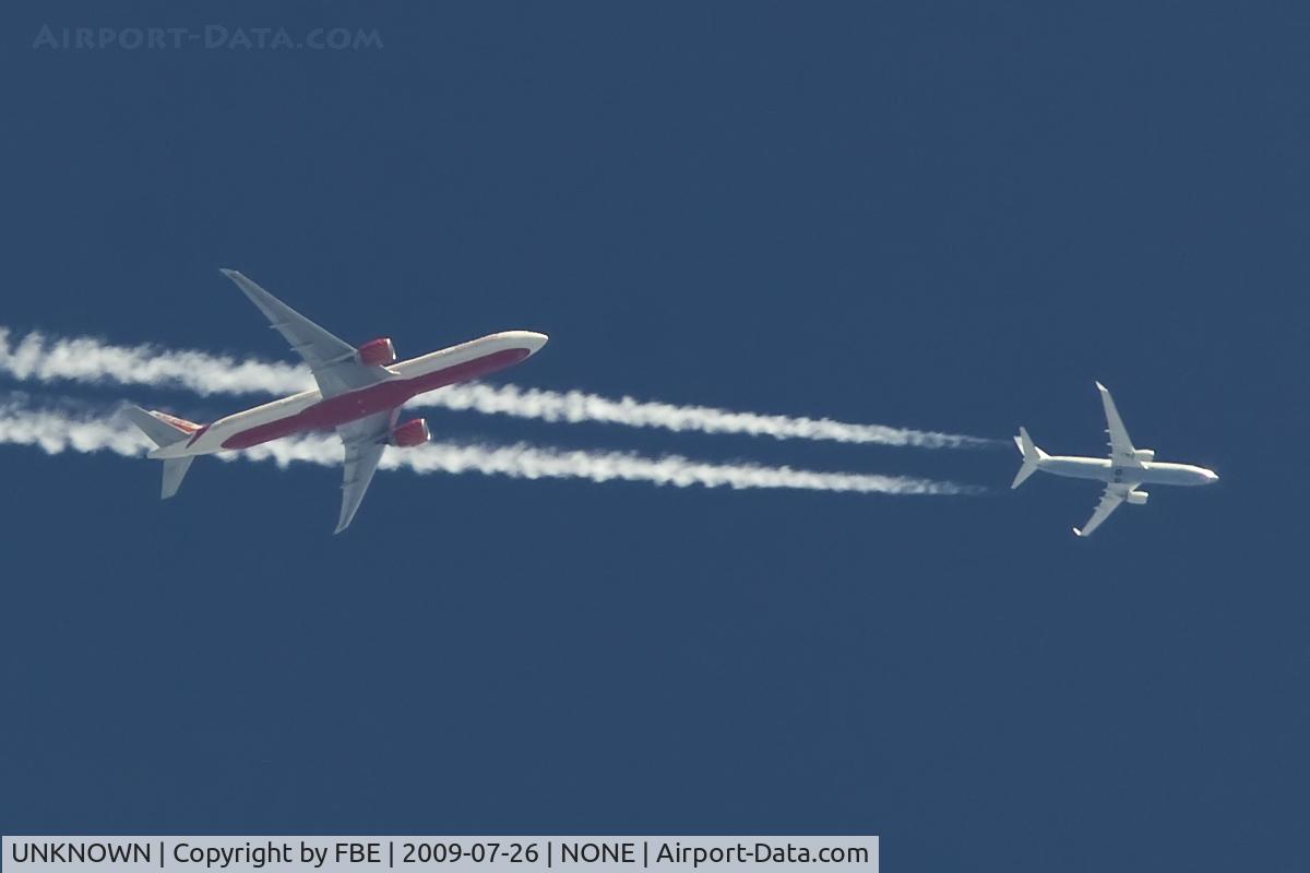 UNKNOWN, Contrails Various C/N Unknown, Air India Triple Seven crosses the contrail of an unknown 737