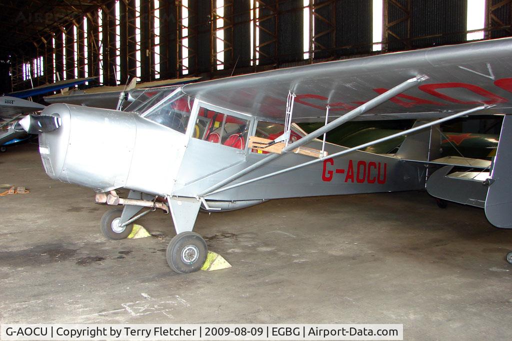 G-AOCU, 1945 Taylorcraft G Auster 4 C/N 986, Auster hangared at Leicester