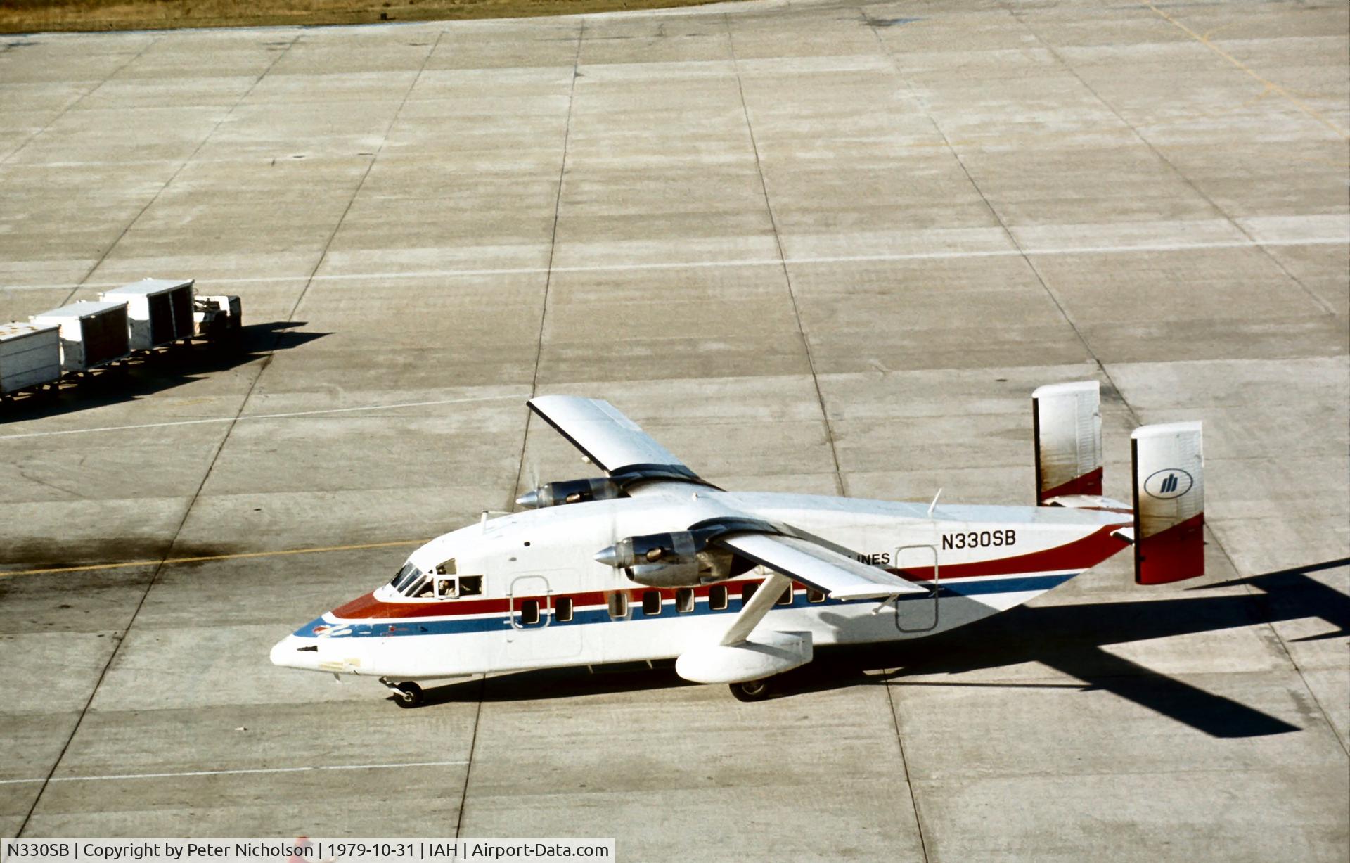 N330SB, 1977 Short SD3-30 C/N SH3013, Shorts 330 of Metro Airlines arriving at the terminal of Houston International in October 1979.