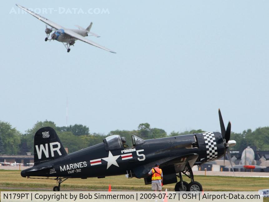N179PT, 1948 Vought F4U-5 Corsair C/N Not found (Bu122179), N8407 in the background at Airventure 2009 - Oshkosh, Wisconsin