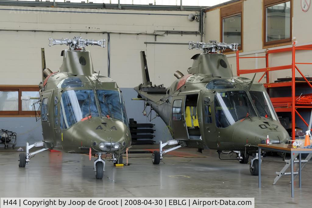 H44, Agusta A-109BA C/N 0344, H44 and H07 are semi dismanteled in the hangar awaiting their fate.