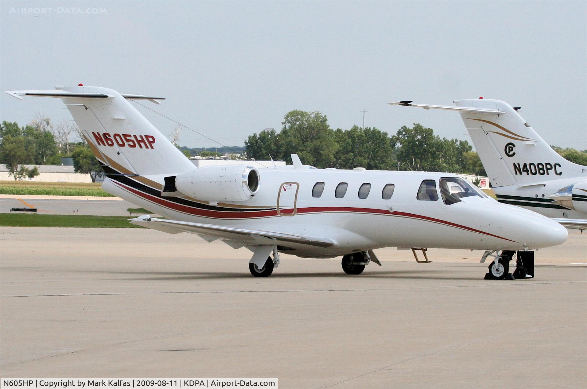 N605HP, 1999 Cessna 525 CitationJet CJ1 C/N 525-0304, Cessna 525, N605HP on the Ramp KDPA after a flight from KACT.