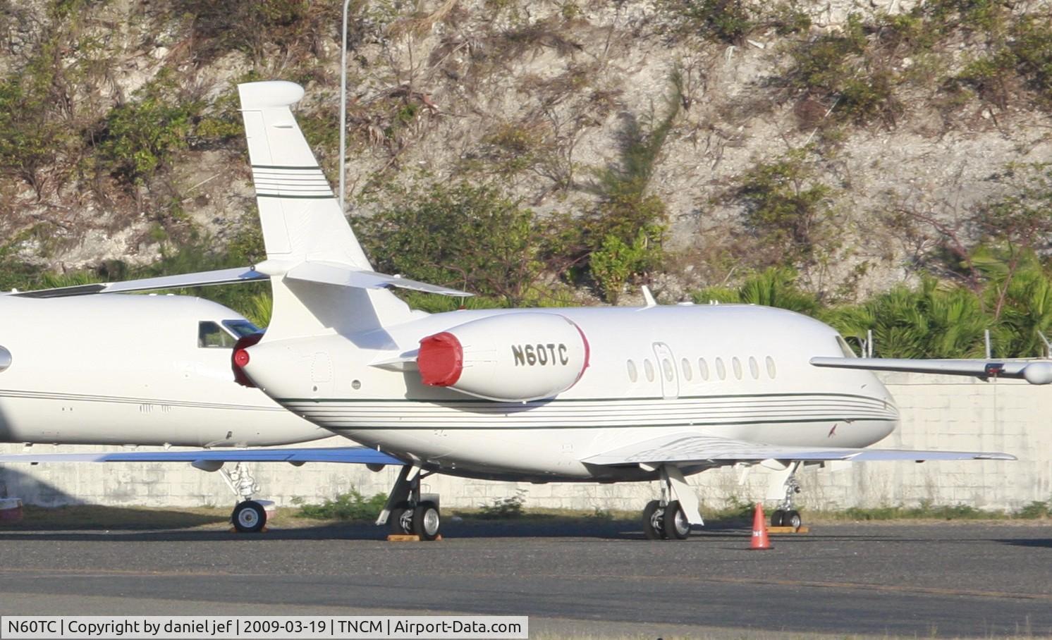N60TC, 1999 Dassault Falcon 2000 C/N 80, park at the cargo ramp taking some sun