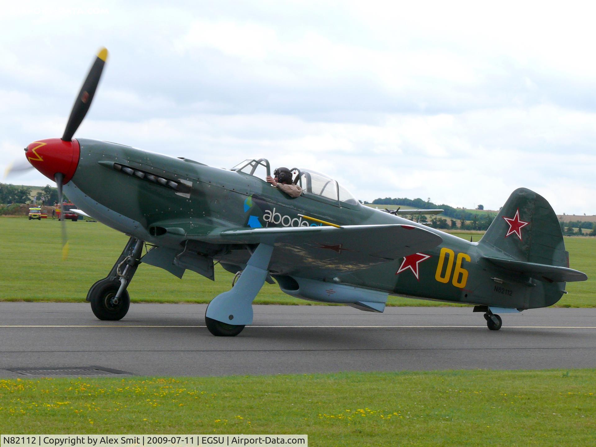 N82112, 1999 Yakovlev Yak-9U-M C/N 0470406, Yakovlev Yak-9UM N82112 The Air Fighter Academy painted as Russian Air Force 06/yellow and with Adobe Globe titles