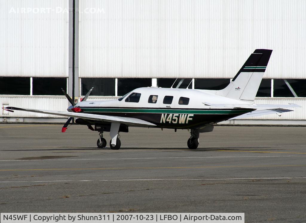 N45WF, 1999 Piper PA-46-350P Malibu Mirage C/N 4636214, Parked at the General Aviation area...