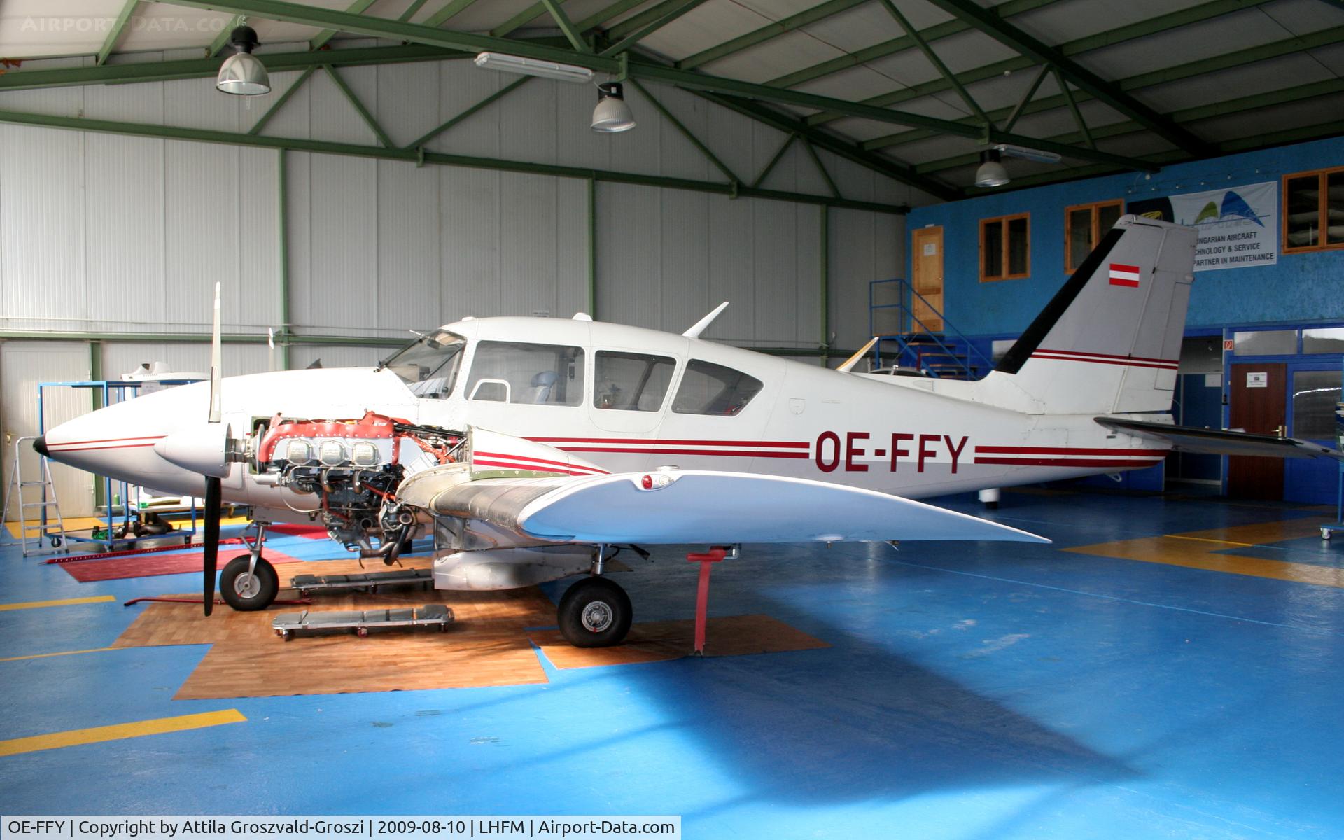 OE-FFY, 1974 Piper PA-23-250 Aztec E C/N 27-7405365, Hungarian Aircraft Technology & Service hangar