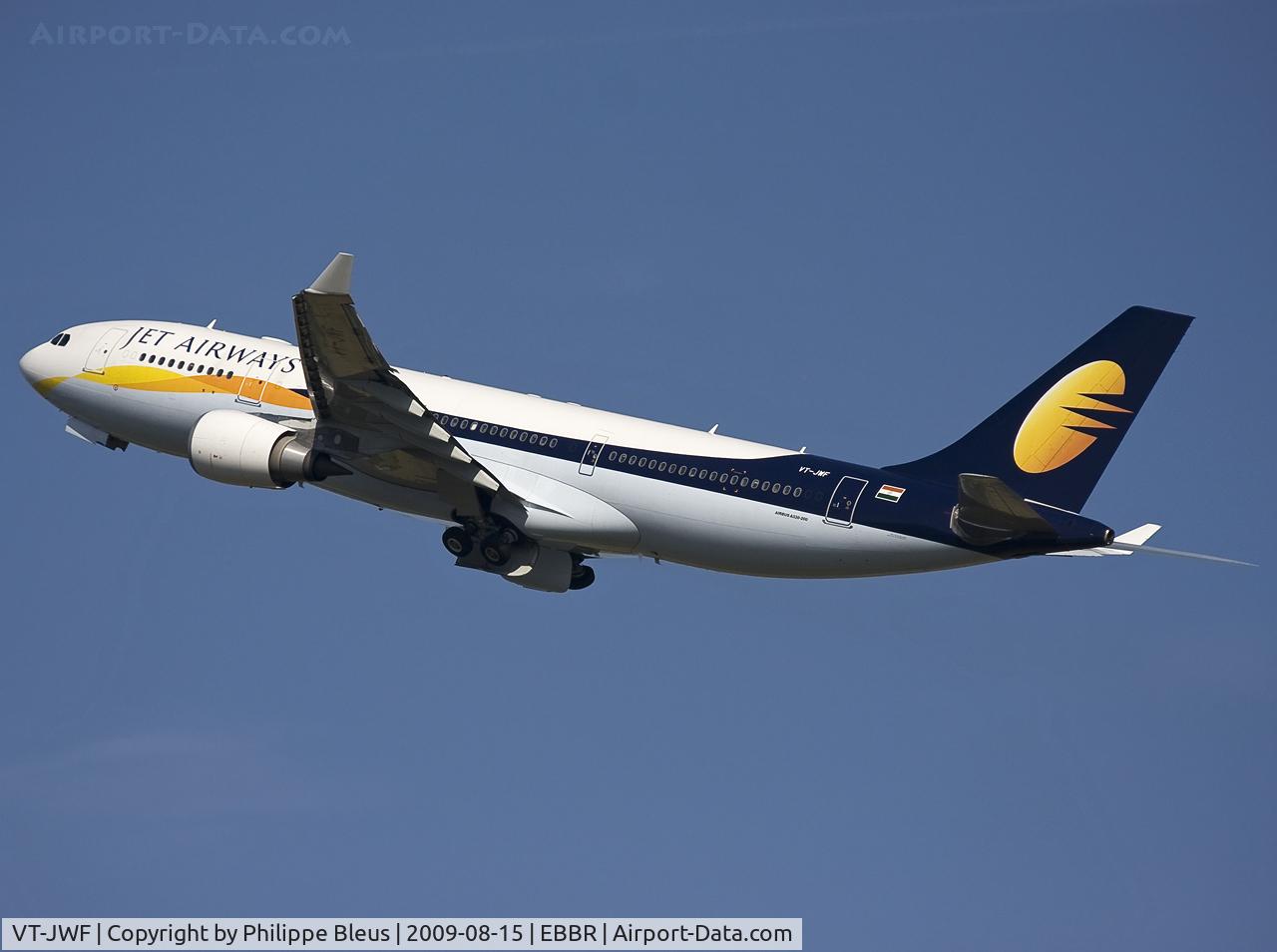 VT-JWF, 2007 Airbus A330-202 C/N 825, Climbing from rwy 25R, main gear on the move, nose gear back in. All gear doors still open.