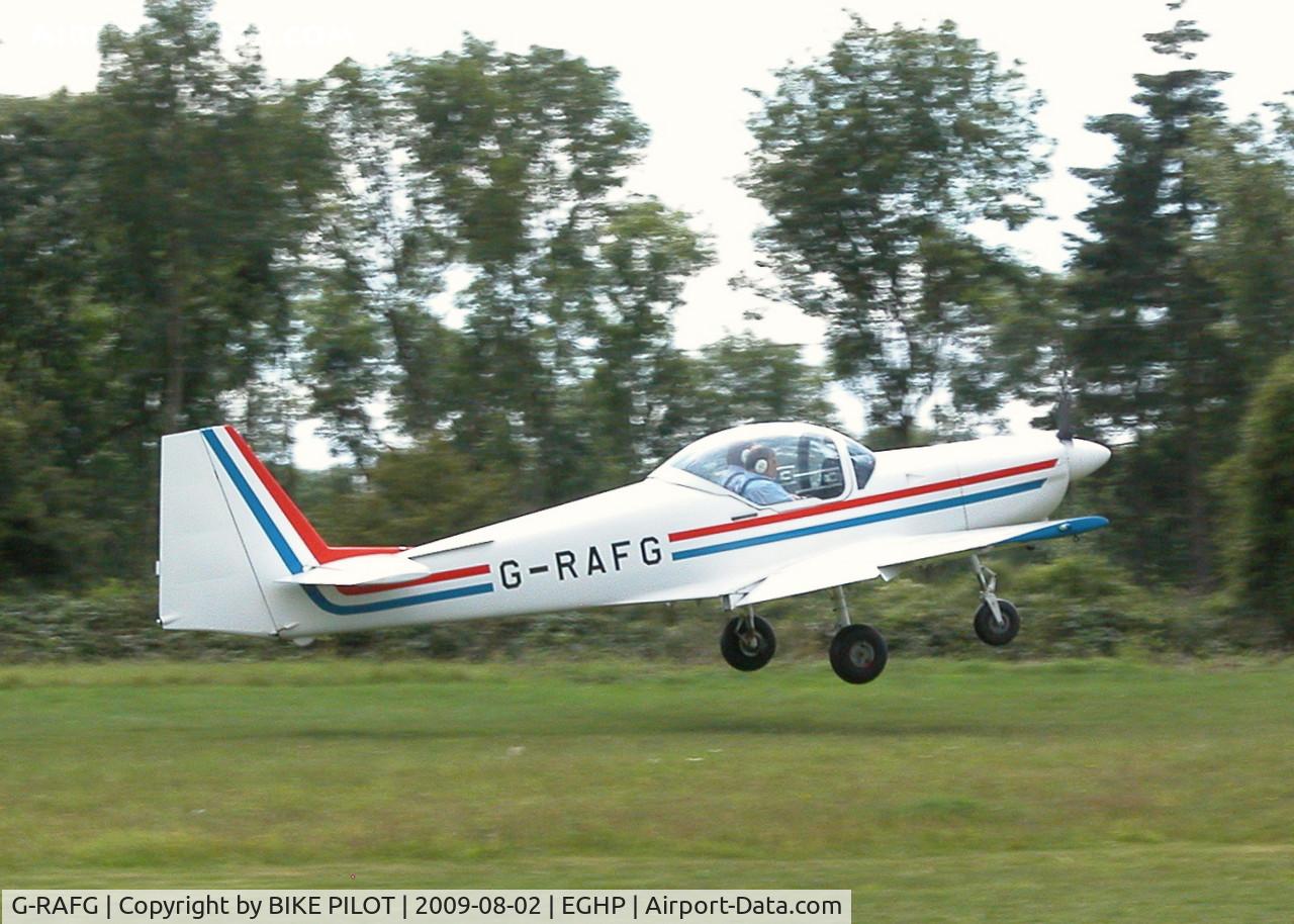 G-RAFG, 1989 Slingsby T-67C Firefly C/N 2076, JUST LEAVING RWY 26