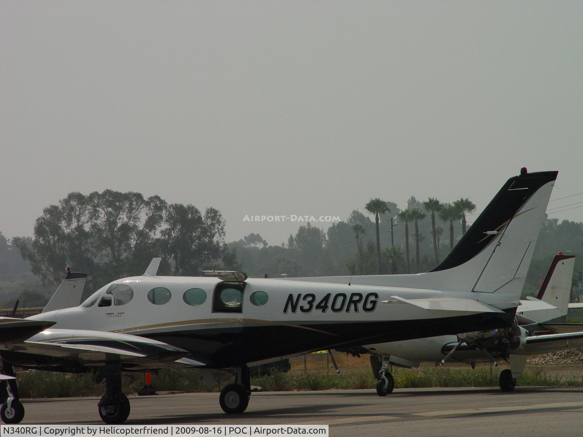 N340RG, 1973 Cessna 340 C/N 340-0239, Parked at Howard Aviation
