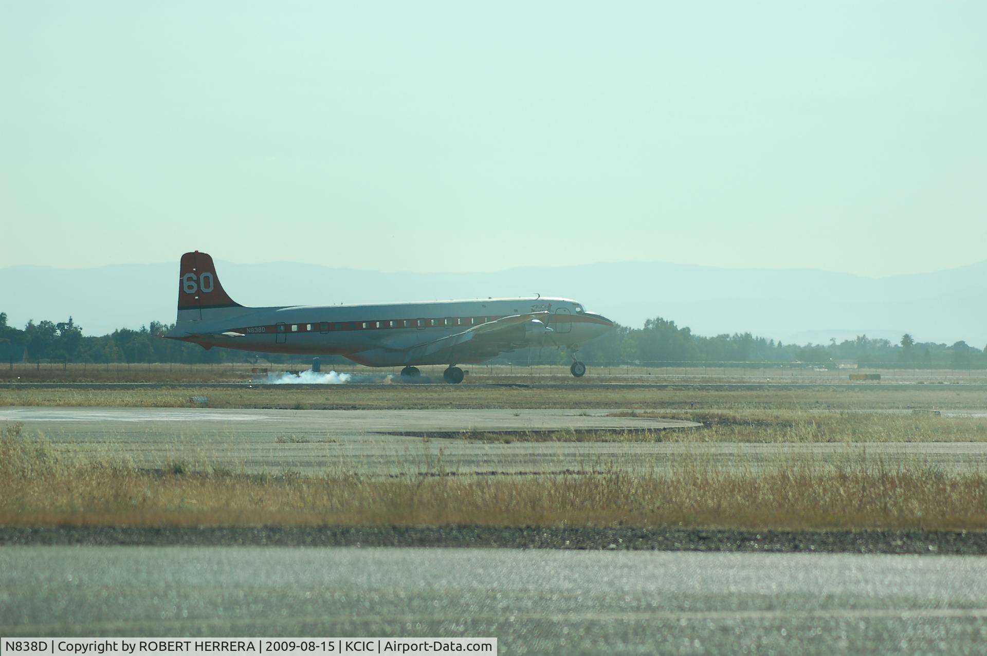 N838D, 1958 Douglas DC-7B C/N 45347, landing in Chico