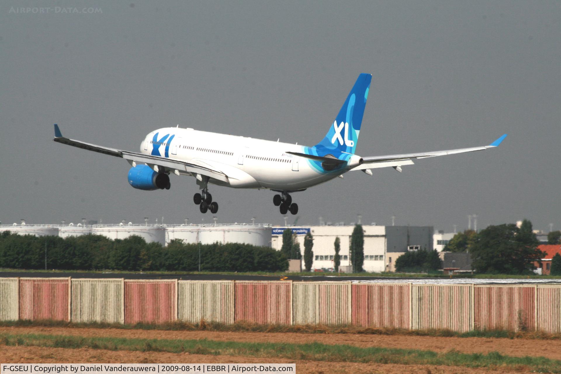 F-GSEU, 2004 Airbus A330-243 C/N 635, several seconds before landing on rwy 25L