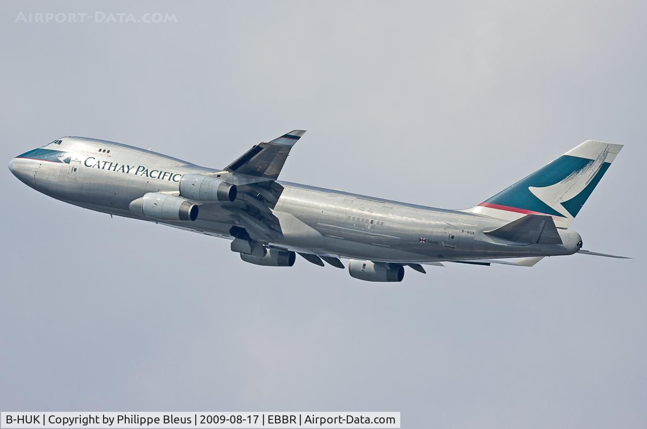 B-HUK, 1995 Boeing 747-467F/SCD C/N 27503, Asian freighter climbing from rwy 25R, just when the sun hid behind a cloud.