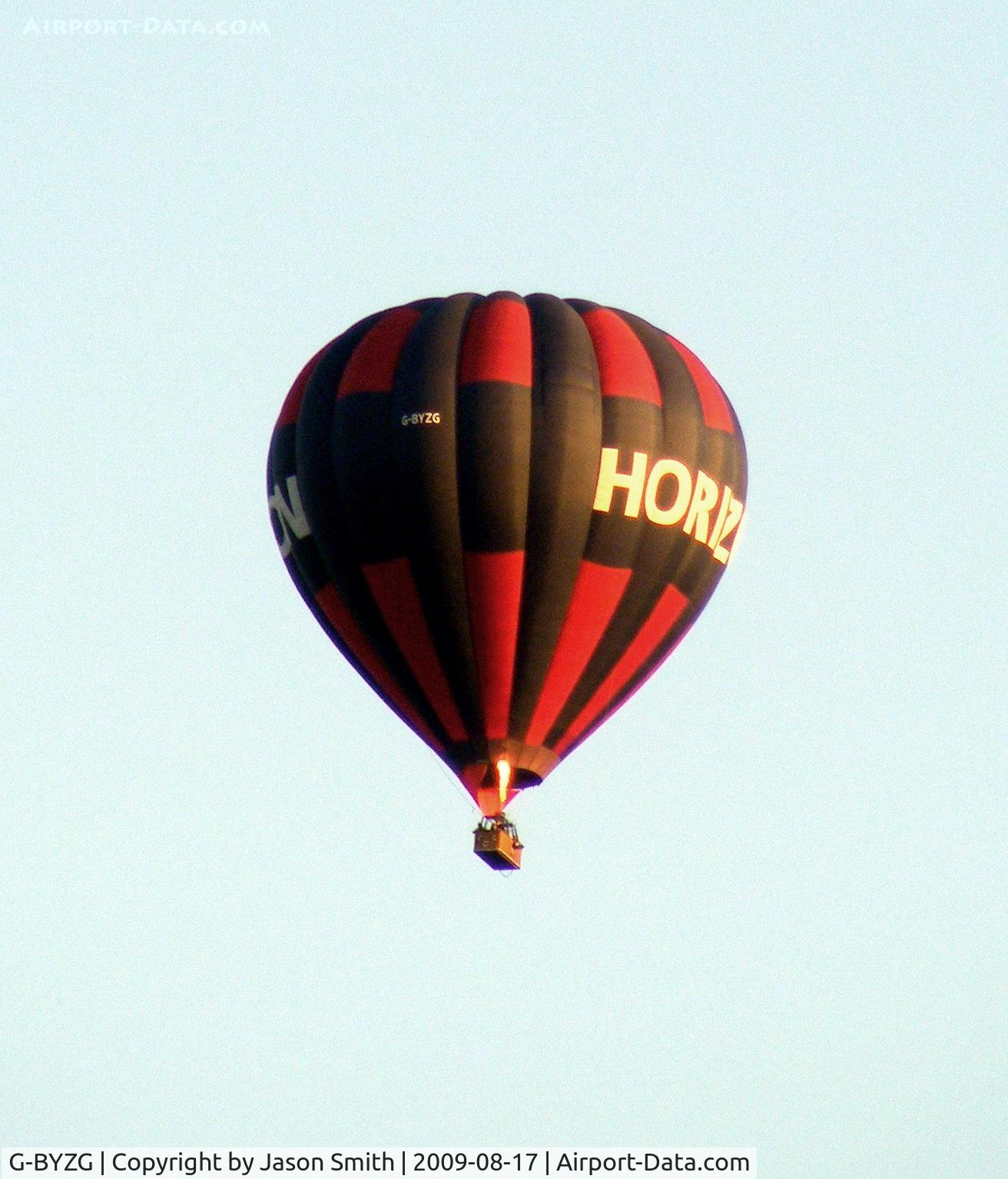 G-BYZG, 1999 Cameron Balloons A-275 C/N 4706, Flying Low Over A Residential Neighbourhood